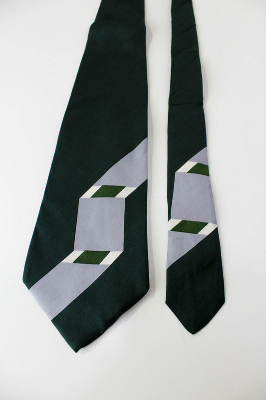 1970s silk wide necktie with green, geometric print made in italy