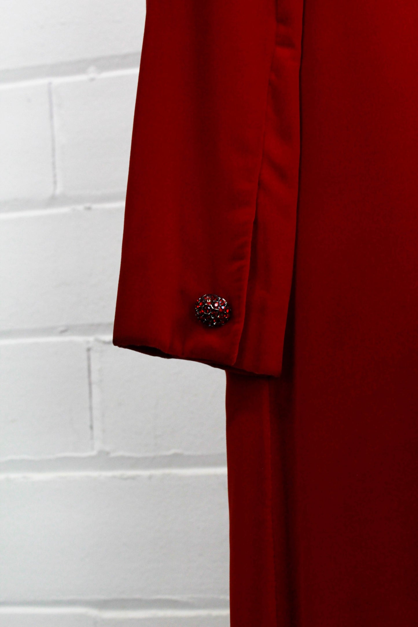 1960s peter pan collar red velvet dress with pockets  close up of button on back sleeve