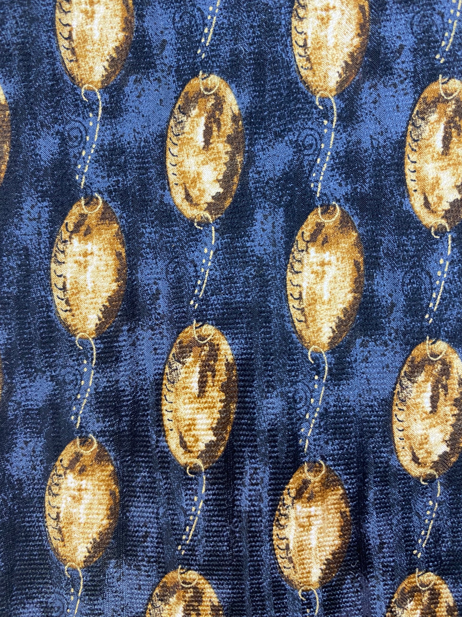 Close-up of: 90s Deadstock Silk Necktie, Men's Vintage Grey/Blue Abstract Golden Oval Pattern Tie, NOS