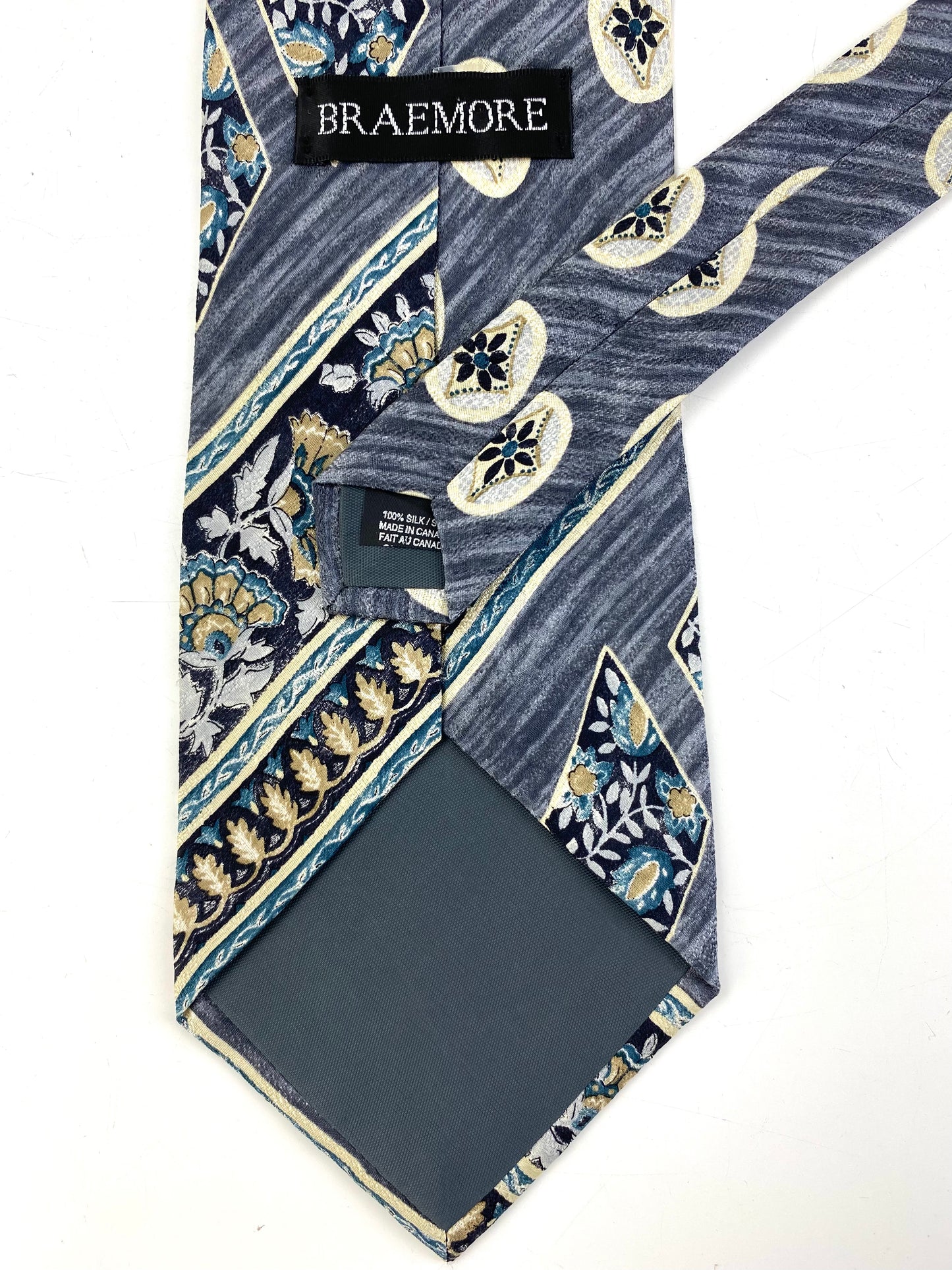 Back and labels of: 90s Deadstock Silk Necktie, Men's Vintage Grey/ Teal Abstract Botanical Pattern Tie, NOS