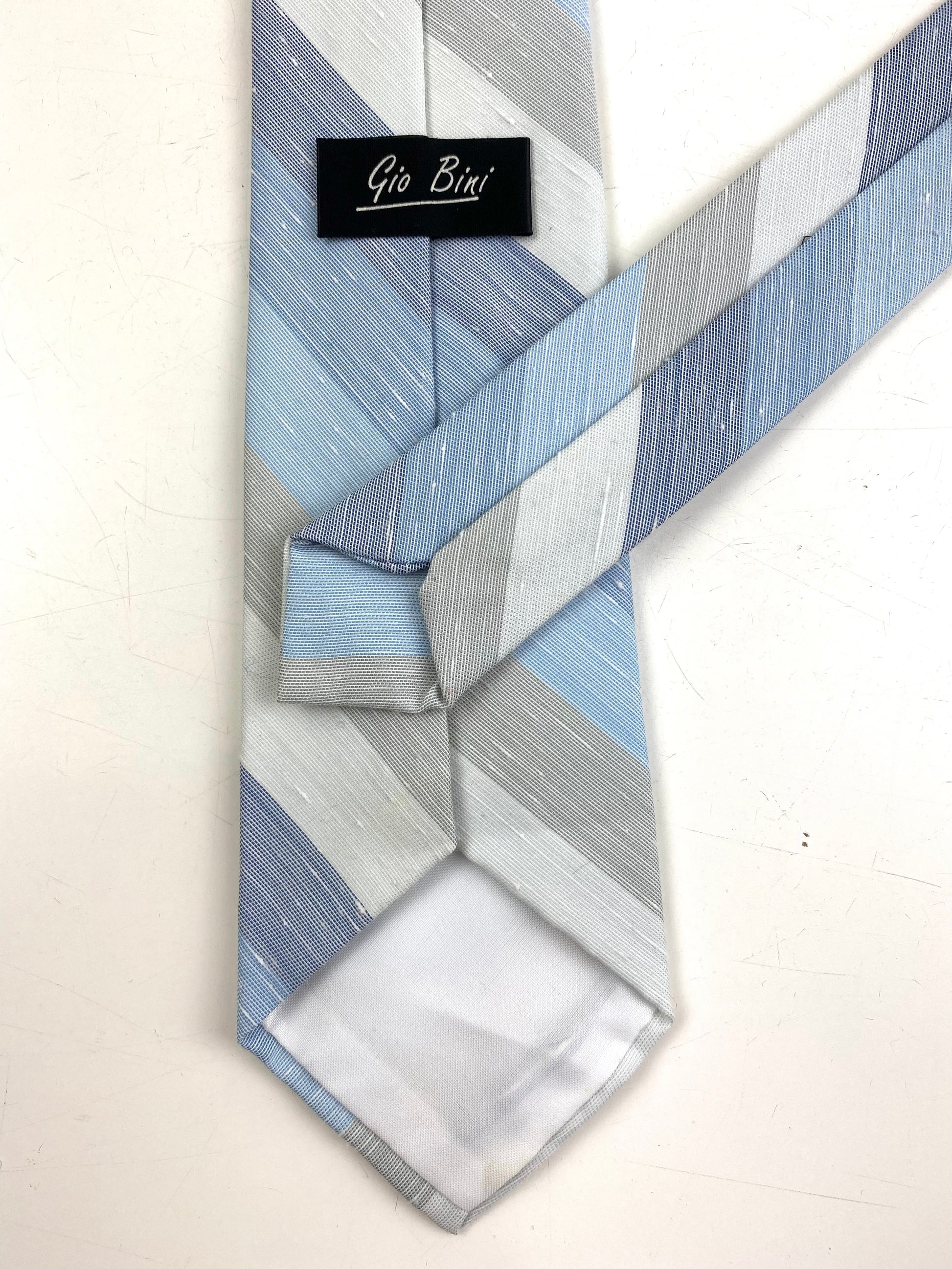 Back and labels of: 80s Deadstock Necktie, Men's Vintage Blue/ Grey Diagonal Stripe Tie, NOS