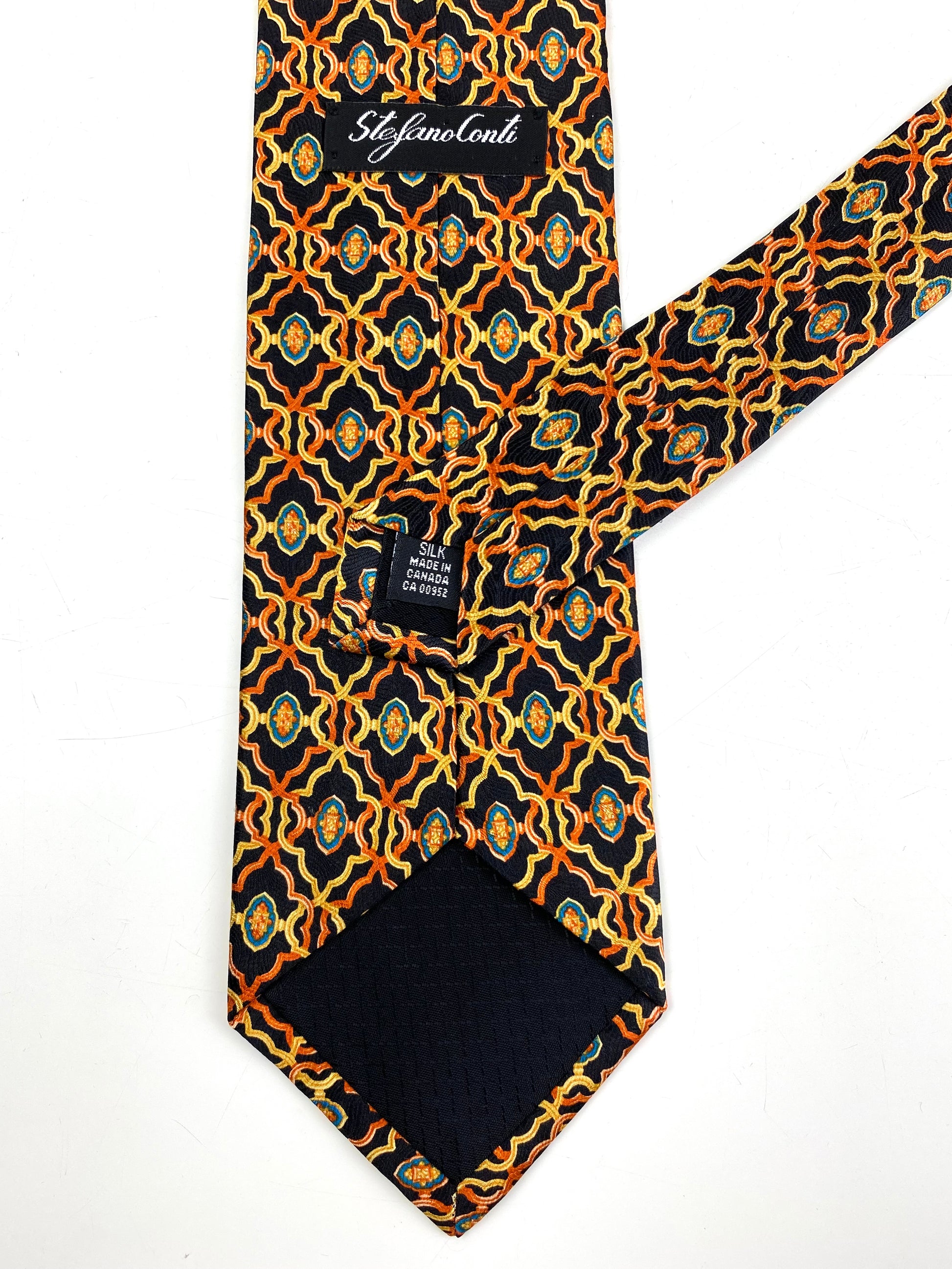 Back and labels of: 90s Deadstock Silk Necktie, Men's Vintage Orange/ Black Geometric Art Deco Pattern Tie, NOS