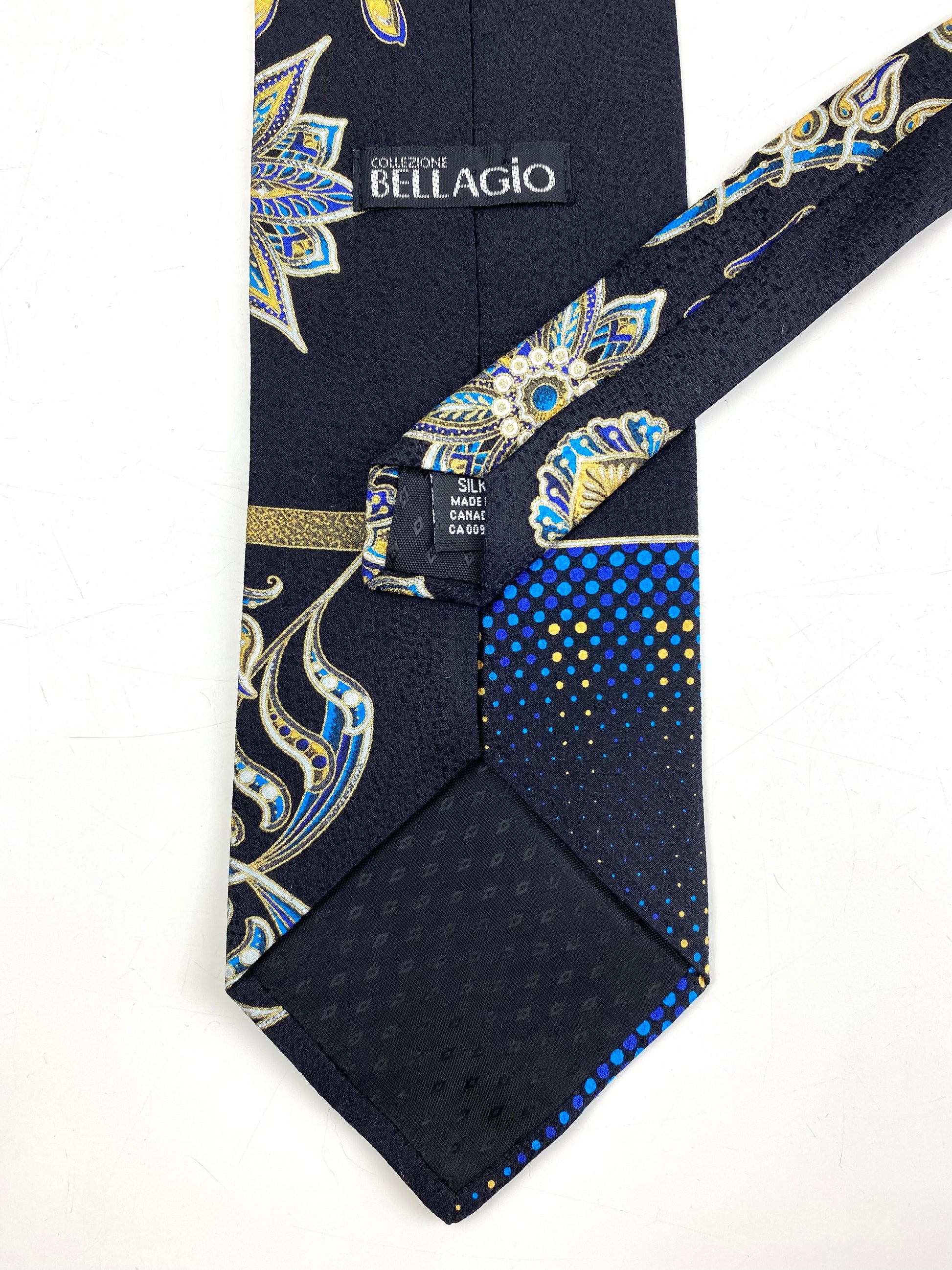 Back and labels of: 90s Deadstock Silk Necktie, Men's Vintage Black/ Blue Indian Pattern Tie, NOS