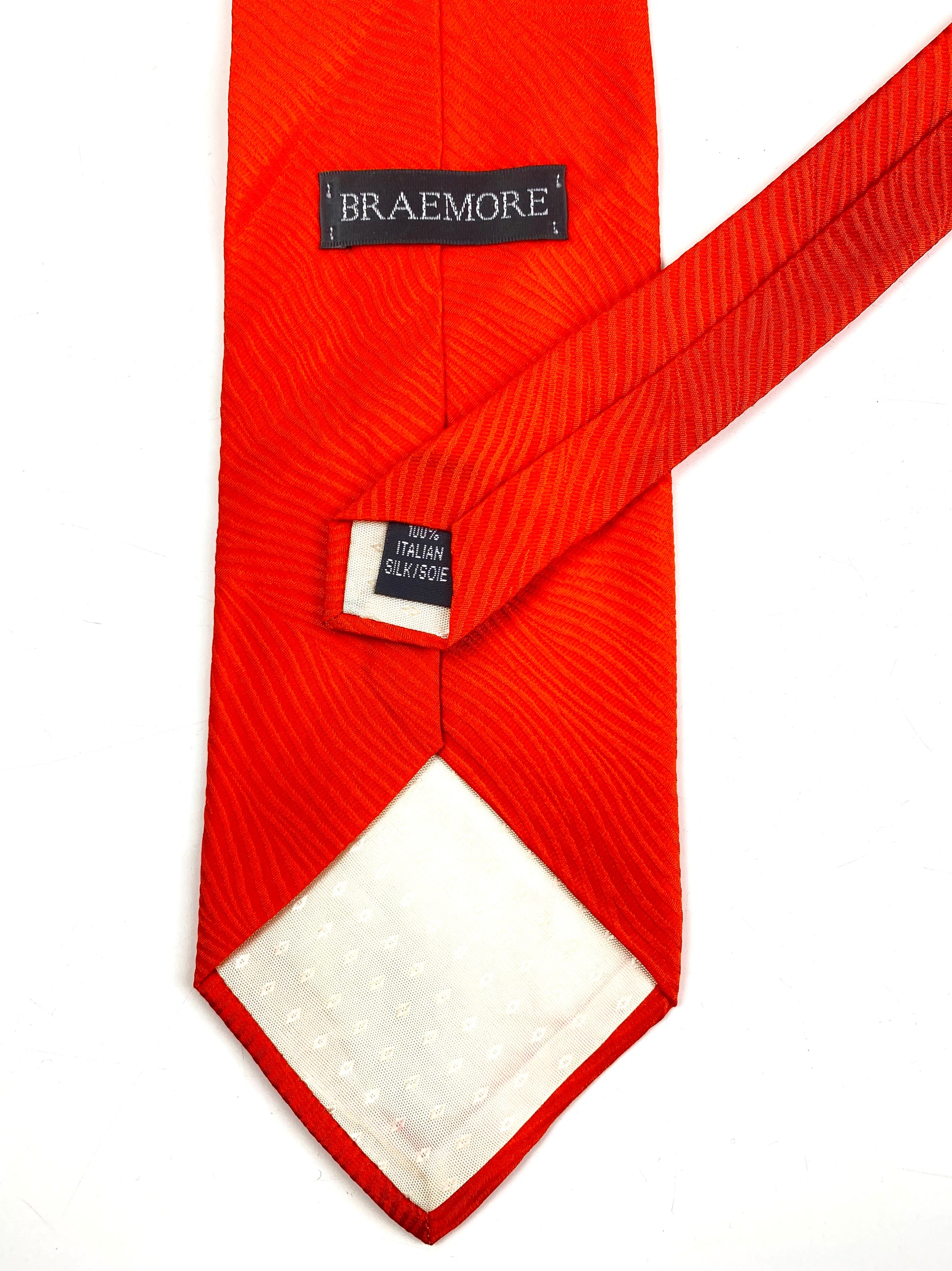 Back and labels of: 90s Deadstock Silk Necktie, Men's Vintage Solid Orange Textured Tie, NOS