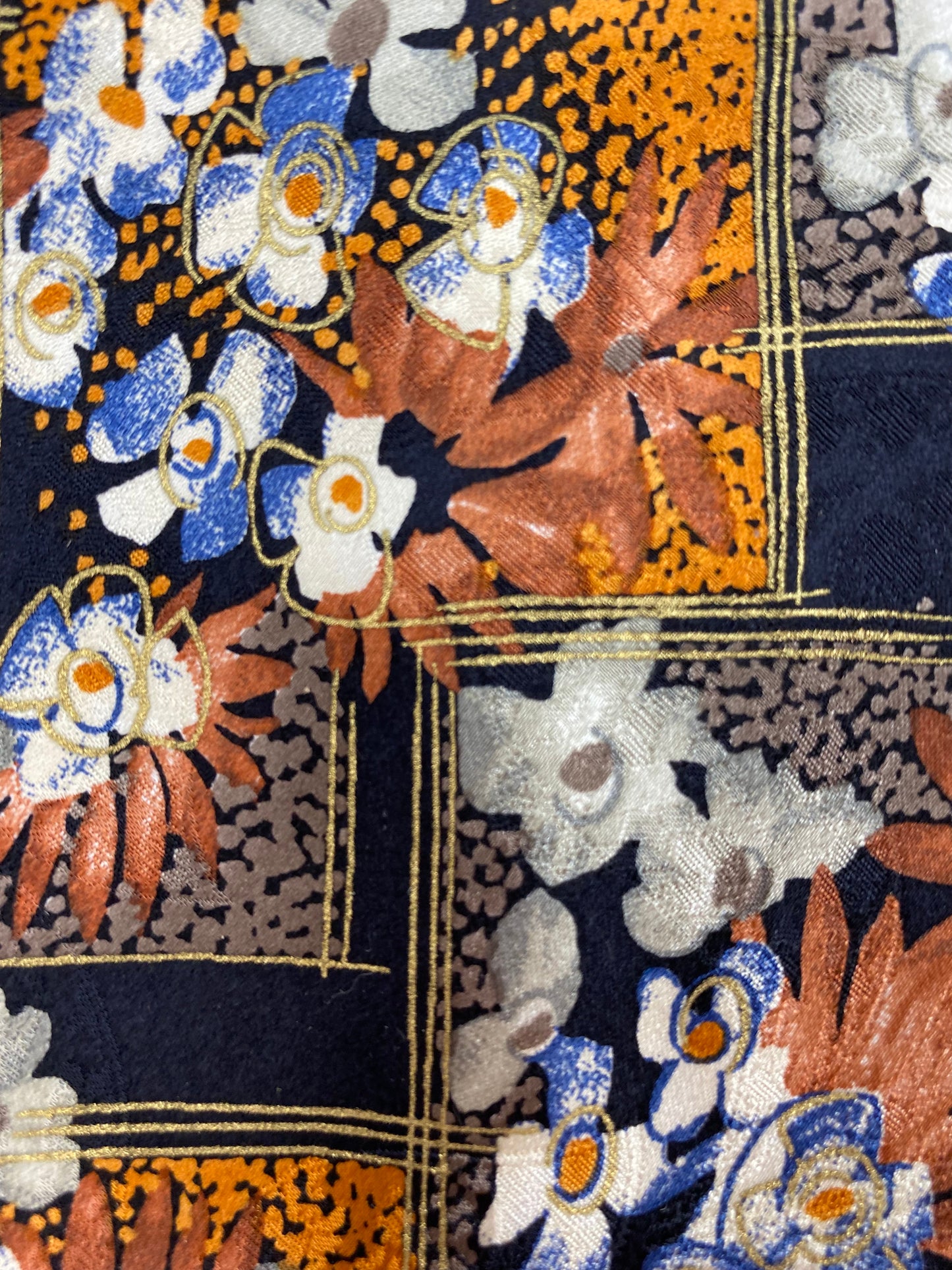 Close-up detail of: 90s Deadstock Silk Necktie, Men's Vintage Orange/ Brown Floral Pattern Tie, NOS