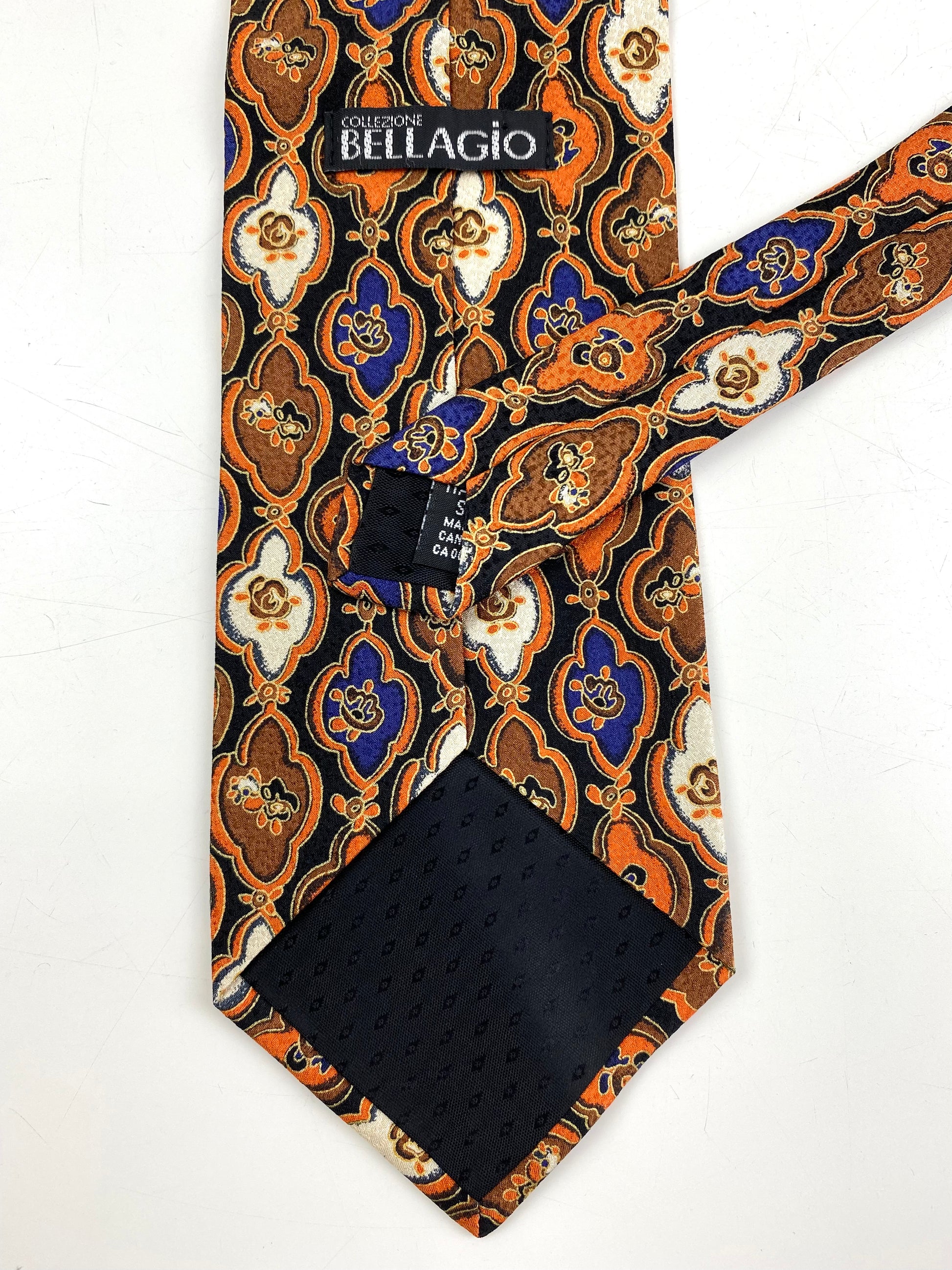 Back and labels of: 90s Deadstock Silk Necktie, Men's Vintage Orange/ Purple/ Brown Abstract Pattern Tie, NOS