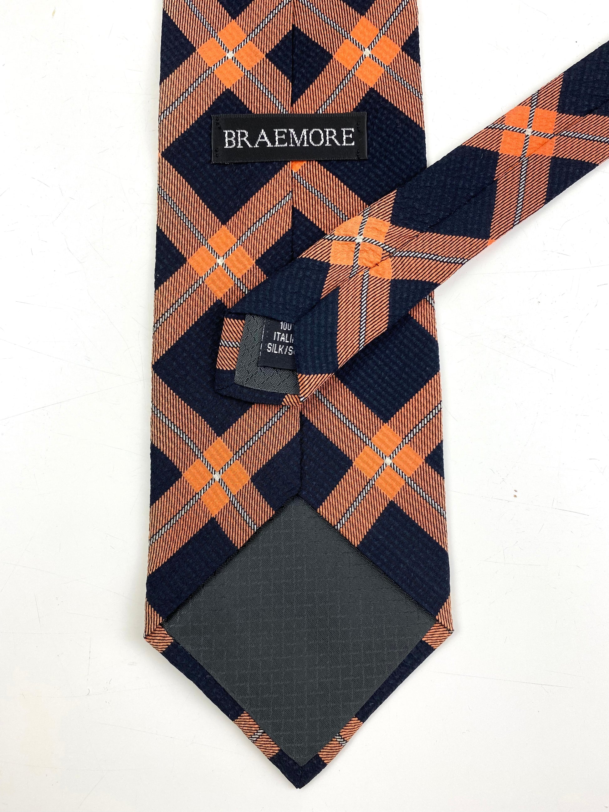 Back and labels of: 90s Deadstock Silk Necktie, Men's Vintage Black/ Orange Check Pattern Tie, NOS
