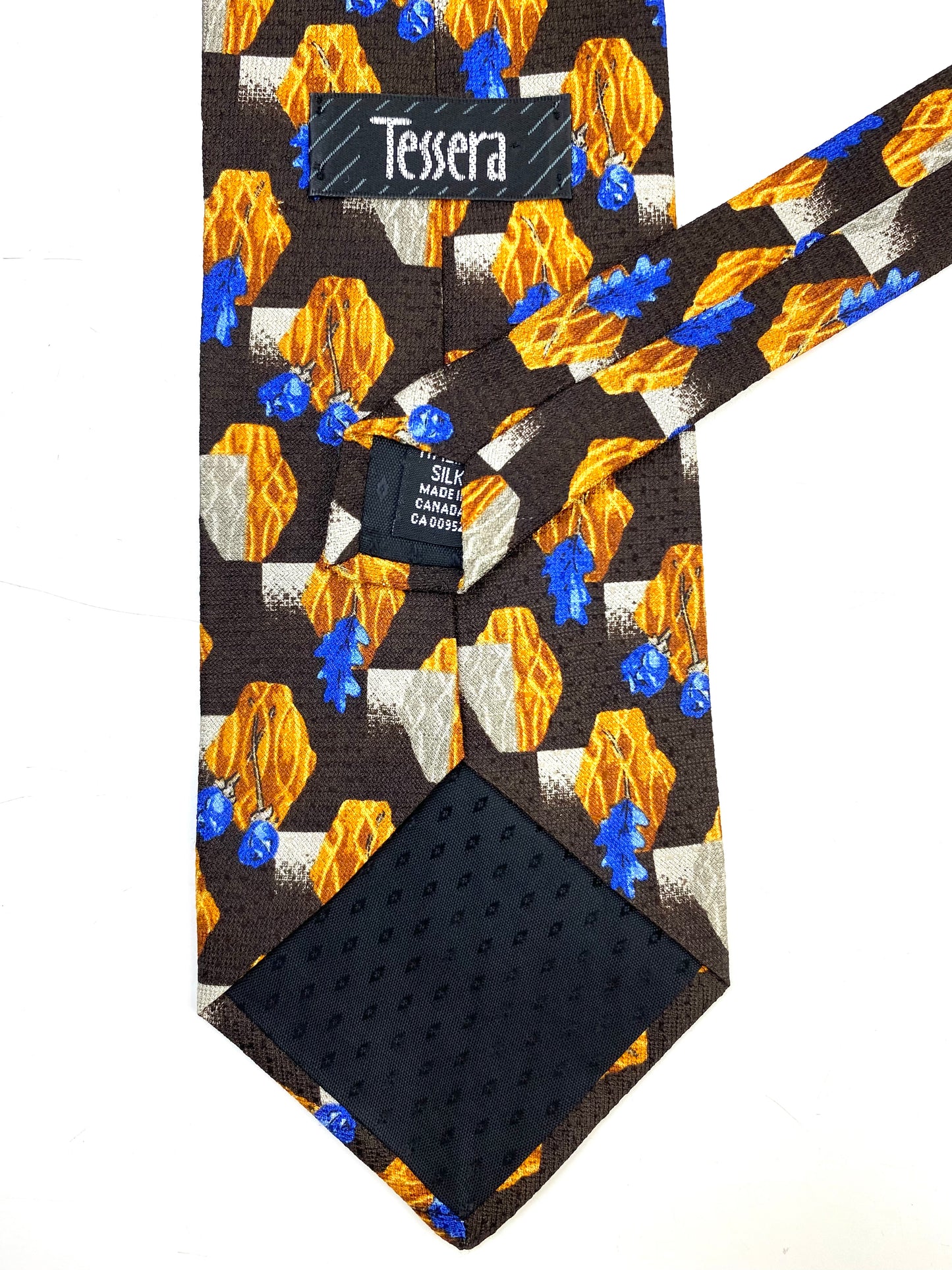 Back and labels of: 90s Deadstock Silk Necktie, Men's Vintage Brown/ Yellow/ Blue Oak Leaf & Rose Print Tie, NOS