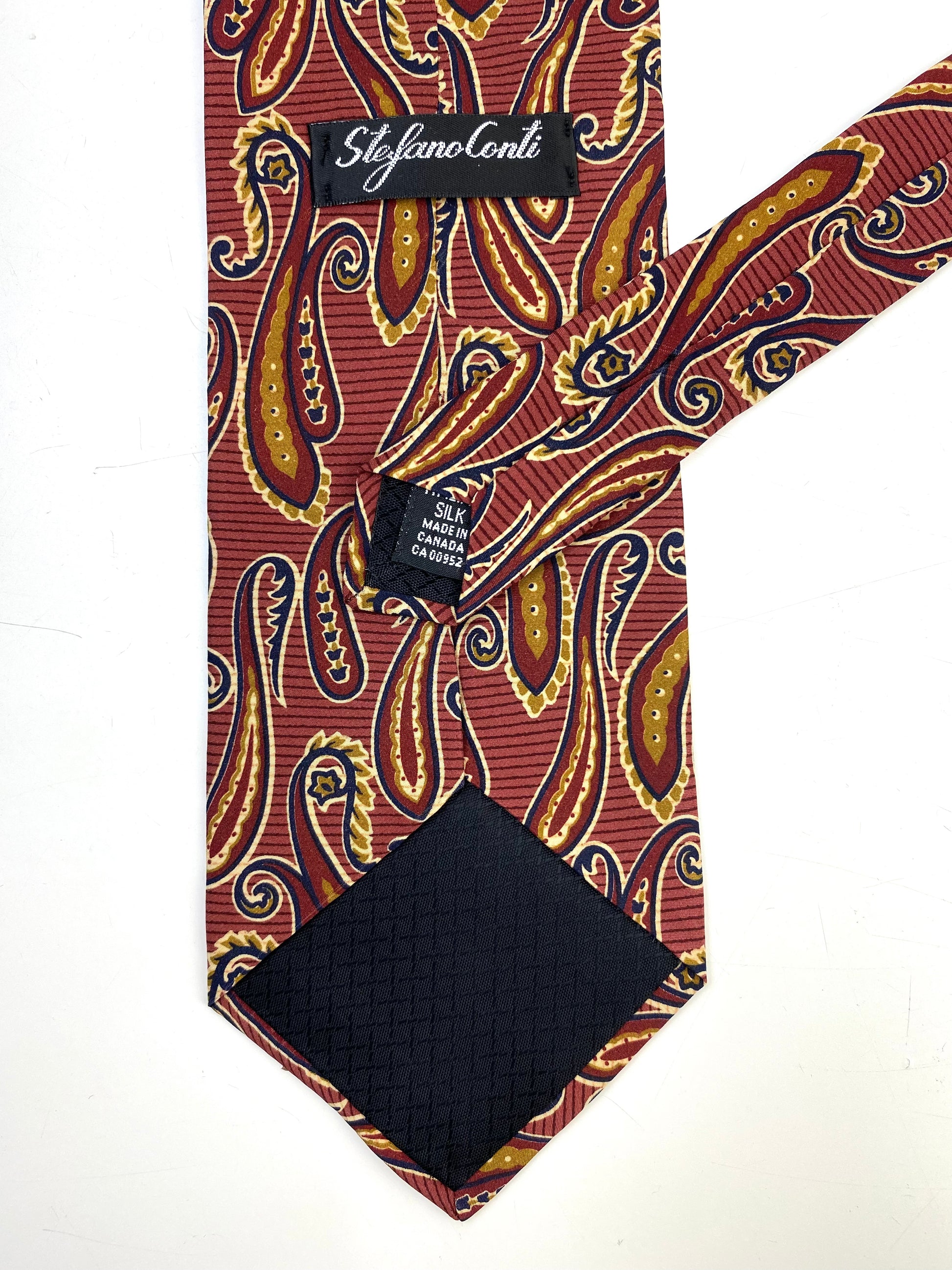 Back and labels of: 90s Deadstock Silk Necktie, Men's Vintage Wine/ Brown-Gold Paisley Pattern Tie, NOS
