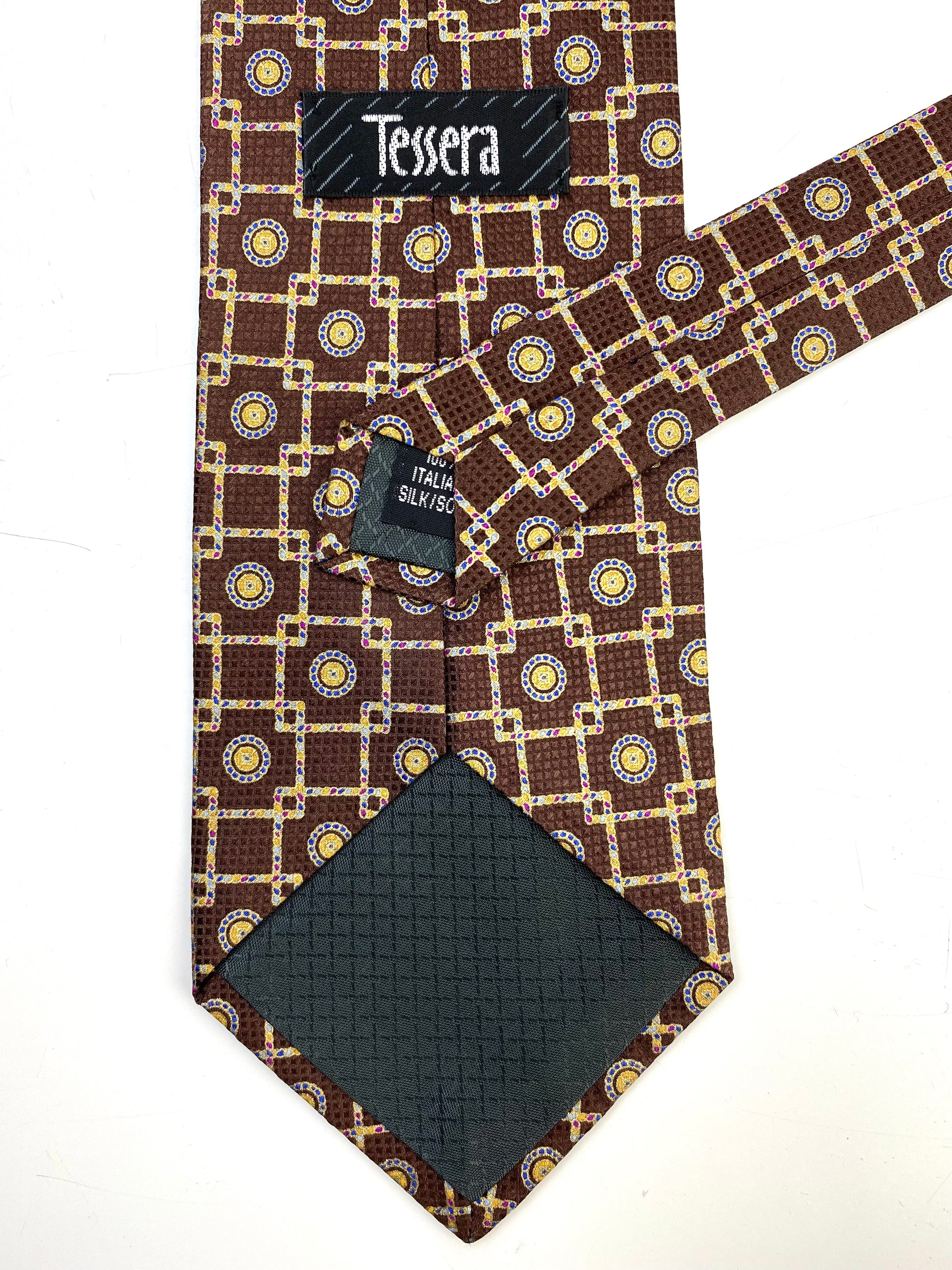 Back and labels of: 90s Deadstock Silk Necktie, Men's Vintage Brown/ Gold Geometric Pattern Tie, NOS