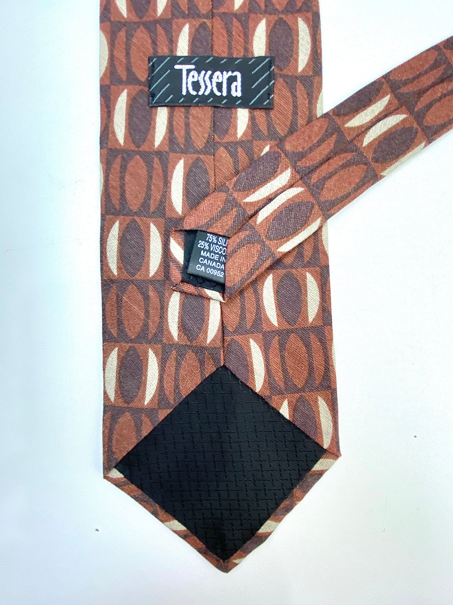 Back and labels of: 90s Deadstock Silk Necktie, Men's Vintage Brown Geometric Pattern Tie, NOS