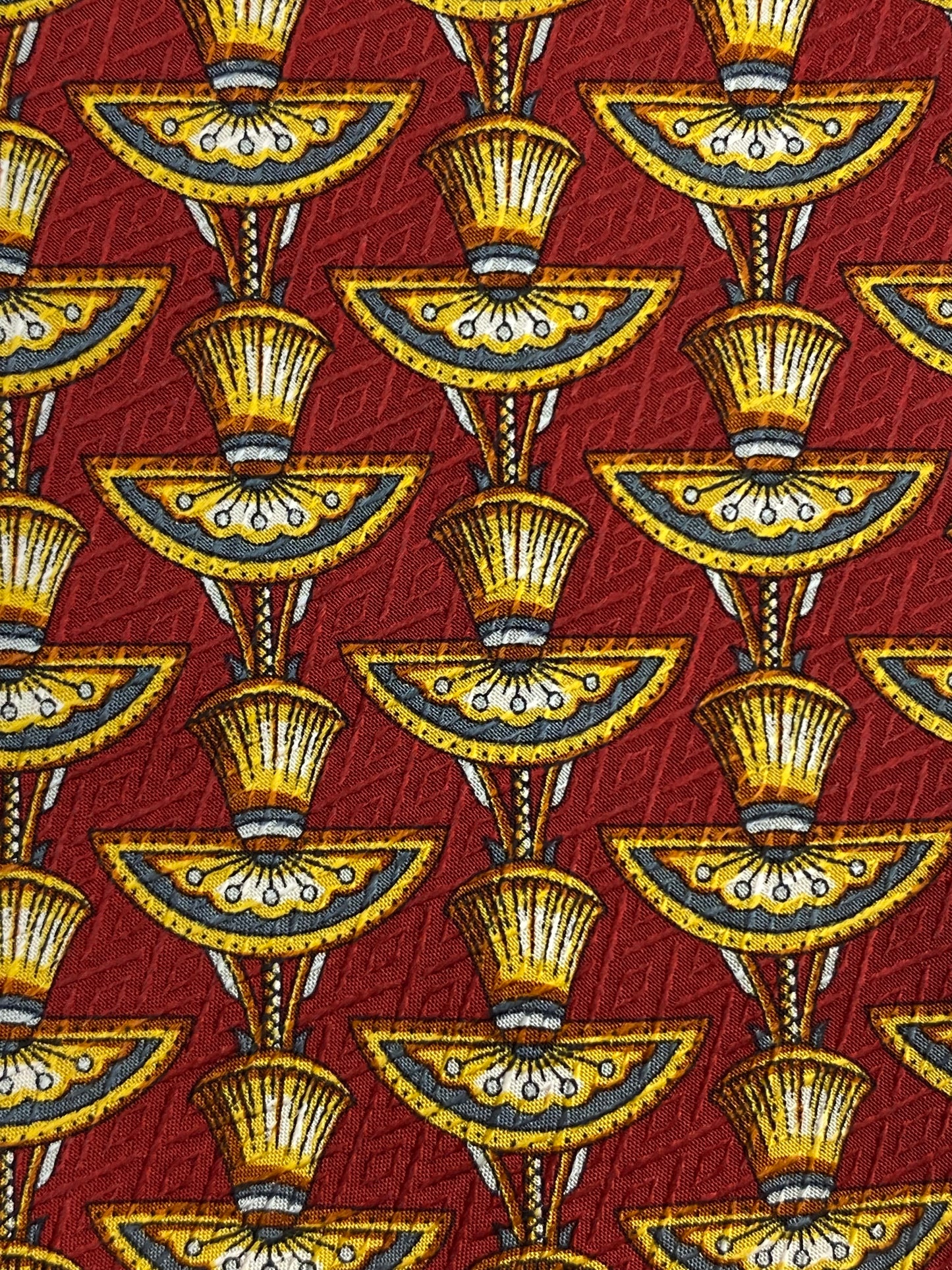 Close-up of: 90s Deadstock Silk Necktie, Men's Vintage Red/ Yellow/ Grey Egyptian Art Deco Pattern Tie, NOS