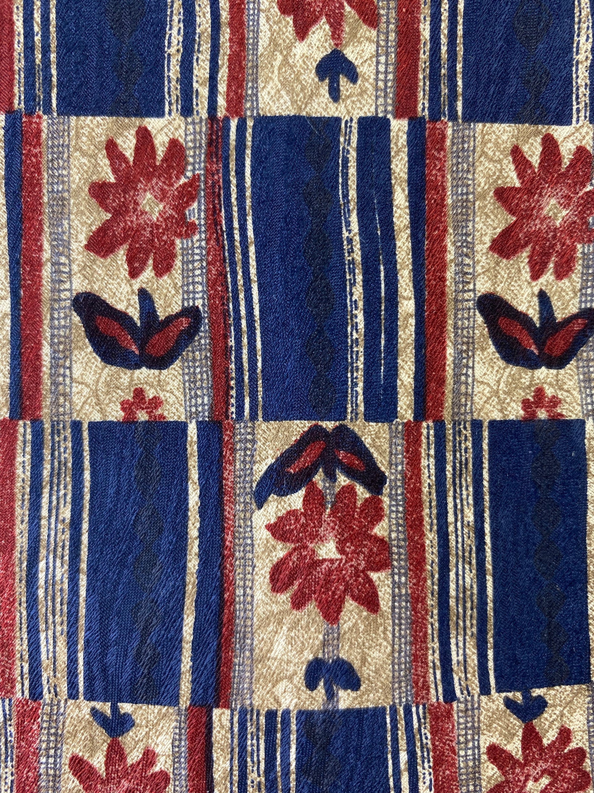 Close-up pattern detail of: 90s Deadstock Silk Necktie, Men's Vintage Blue Red Floral Pattern Tie, NOS