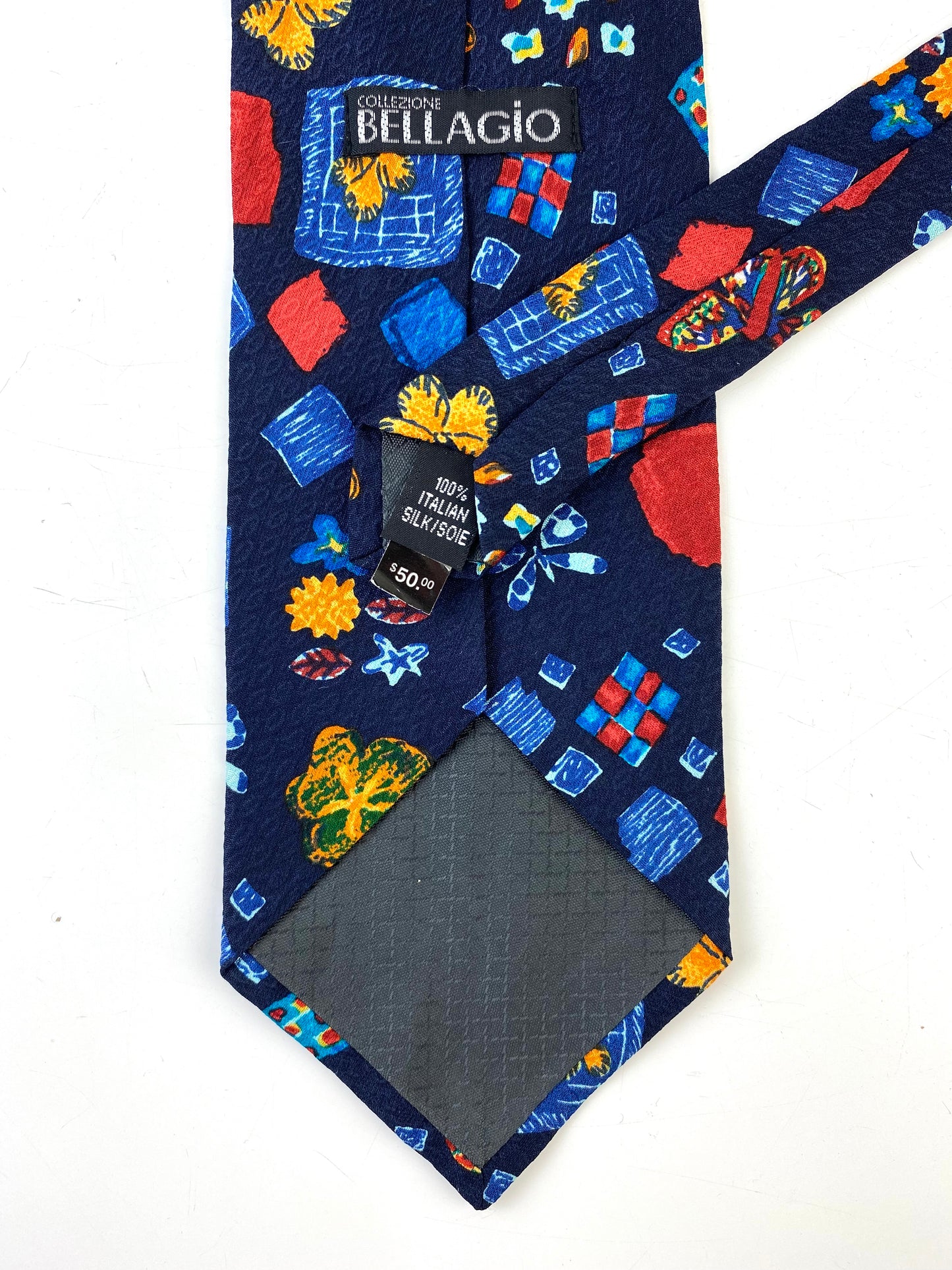 Back detail of: 90s Deadstock Silk Necktie, Men's Vintage Navy/ Red/ Orange Floral Butterfly Pattern, NOS
