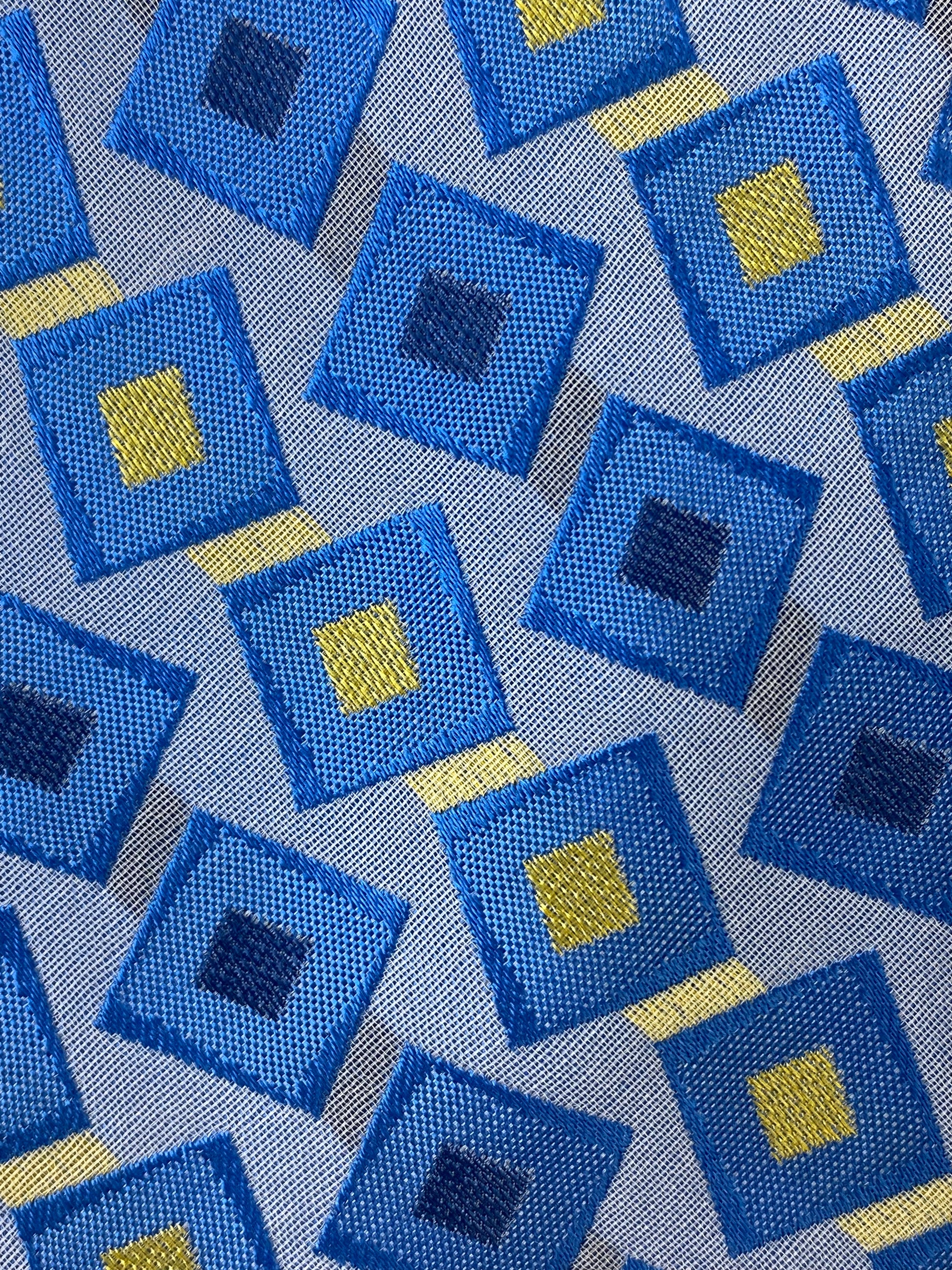 Close-up detail of: 90s Deadstock Silk Necktie, Men's Vintage Blue Yellow Geometric Pattern Tie, NOS