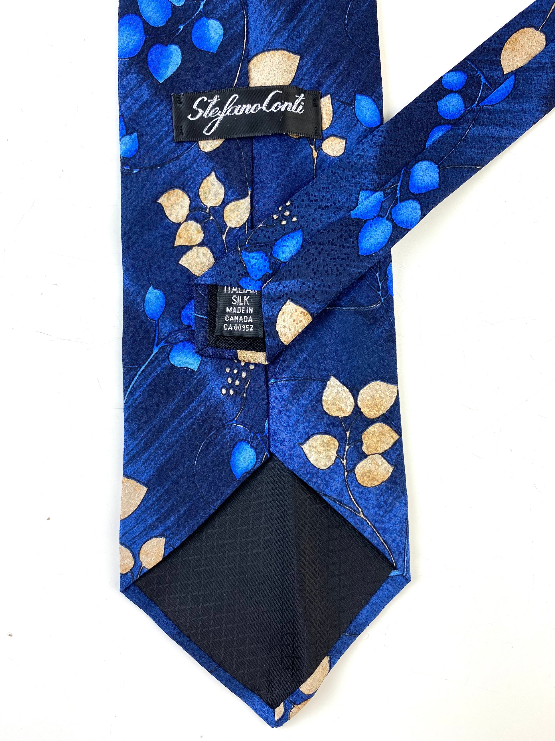 Back detail of: 90s Deadstock Silk Necktie, Men's Vintage Blue/ Beige Botanical Pattern Tie, NOS