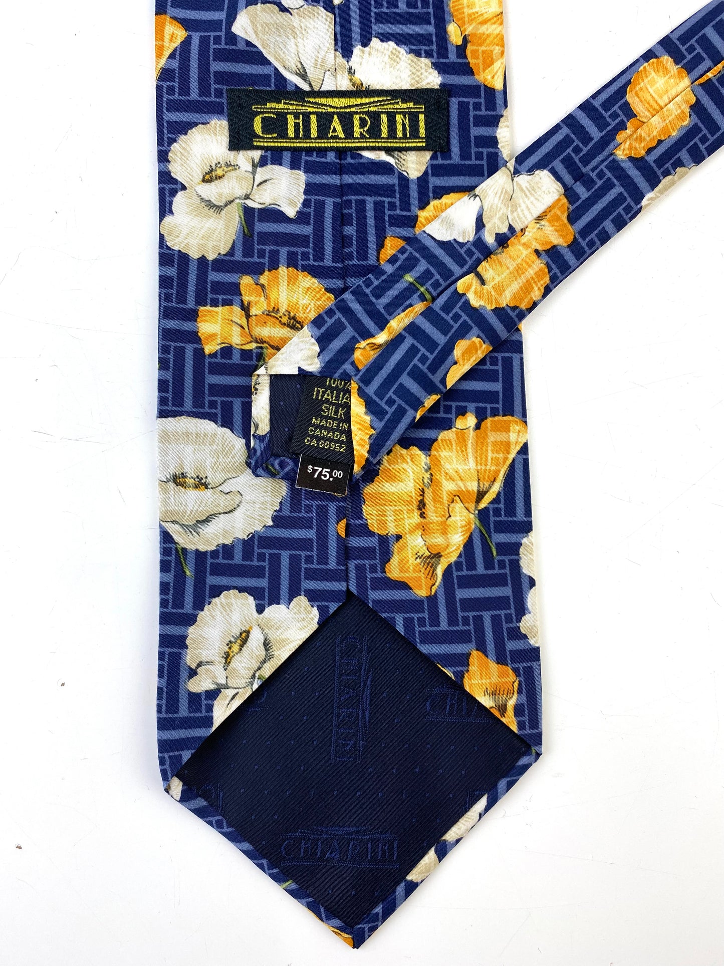 Back detail and labels of: 90s Deadstock Silk Necktie, Men's Vintage Blue Yellow White Floral Basketweave Pattern Tie, NOS