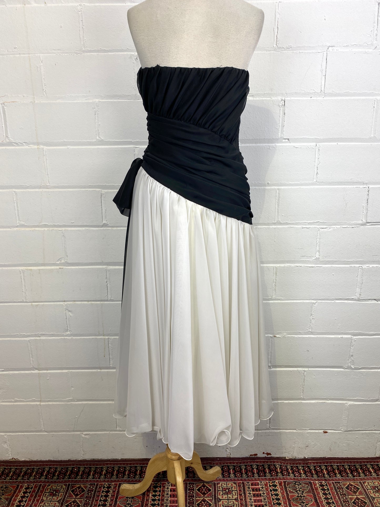 1980s cocktail dress black and white chiffon with bow on the side, strapless vintage party dress frank usher
