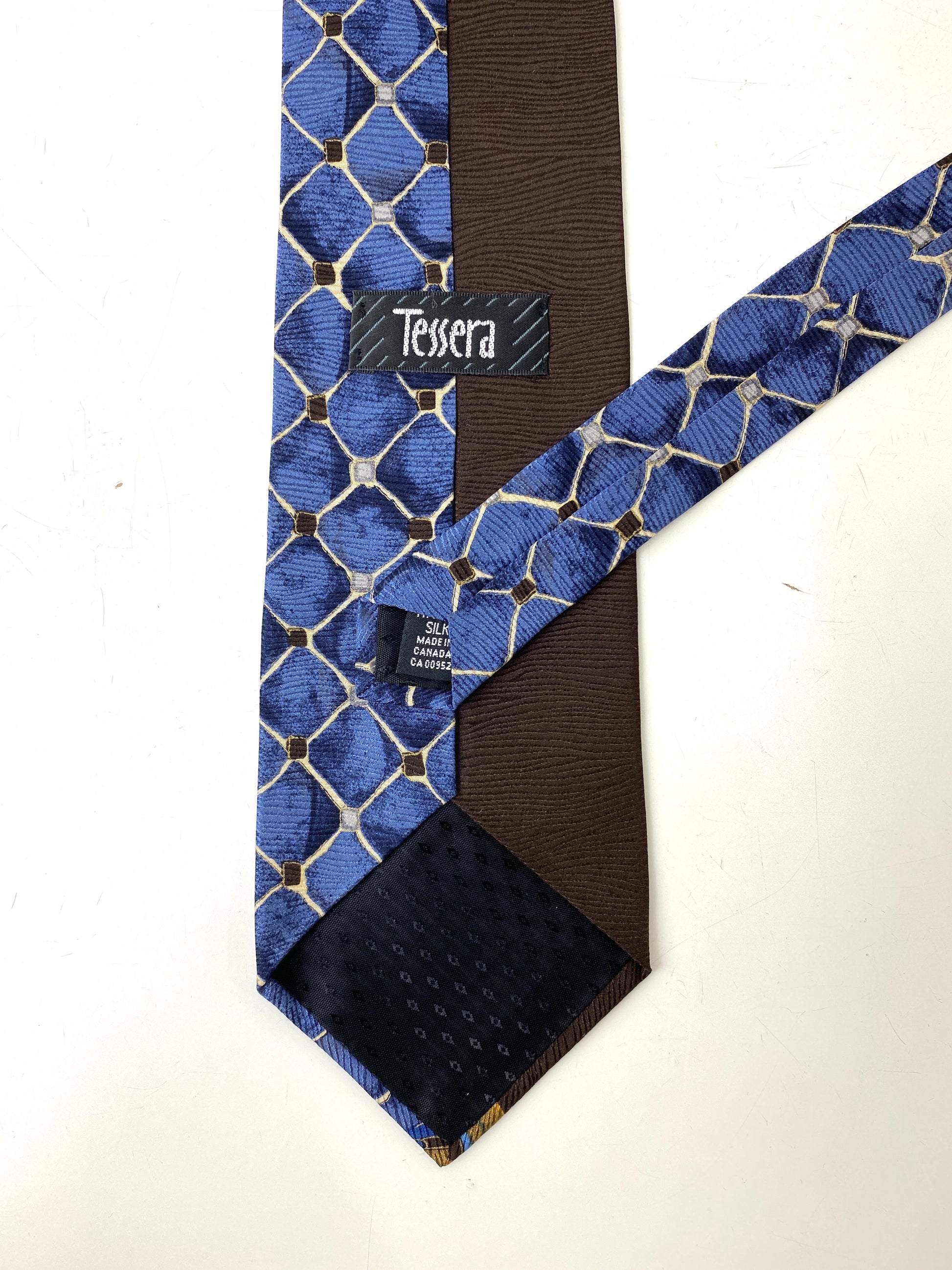 Back and labels of: 90s Deadstock Silk Necktie, Men's Vintage Blue/ Brown/ Gold Oriental Print Tie, NOS