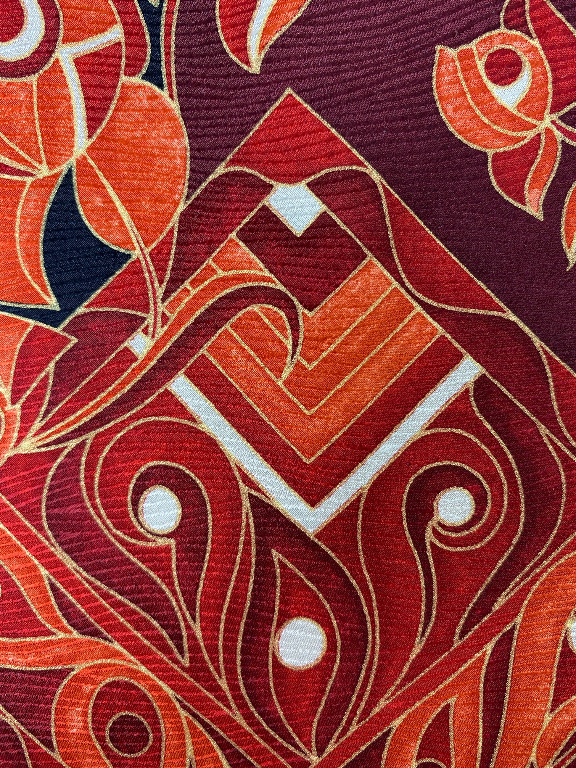 Close-up of: 90s Deadstock Silk Necktie, Men's Vintage Black/ Red/ Orange Oriental Paisley Print Tie, NOS