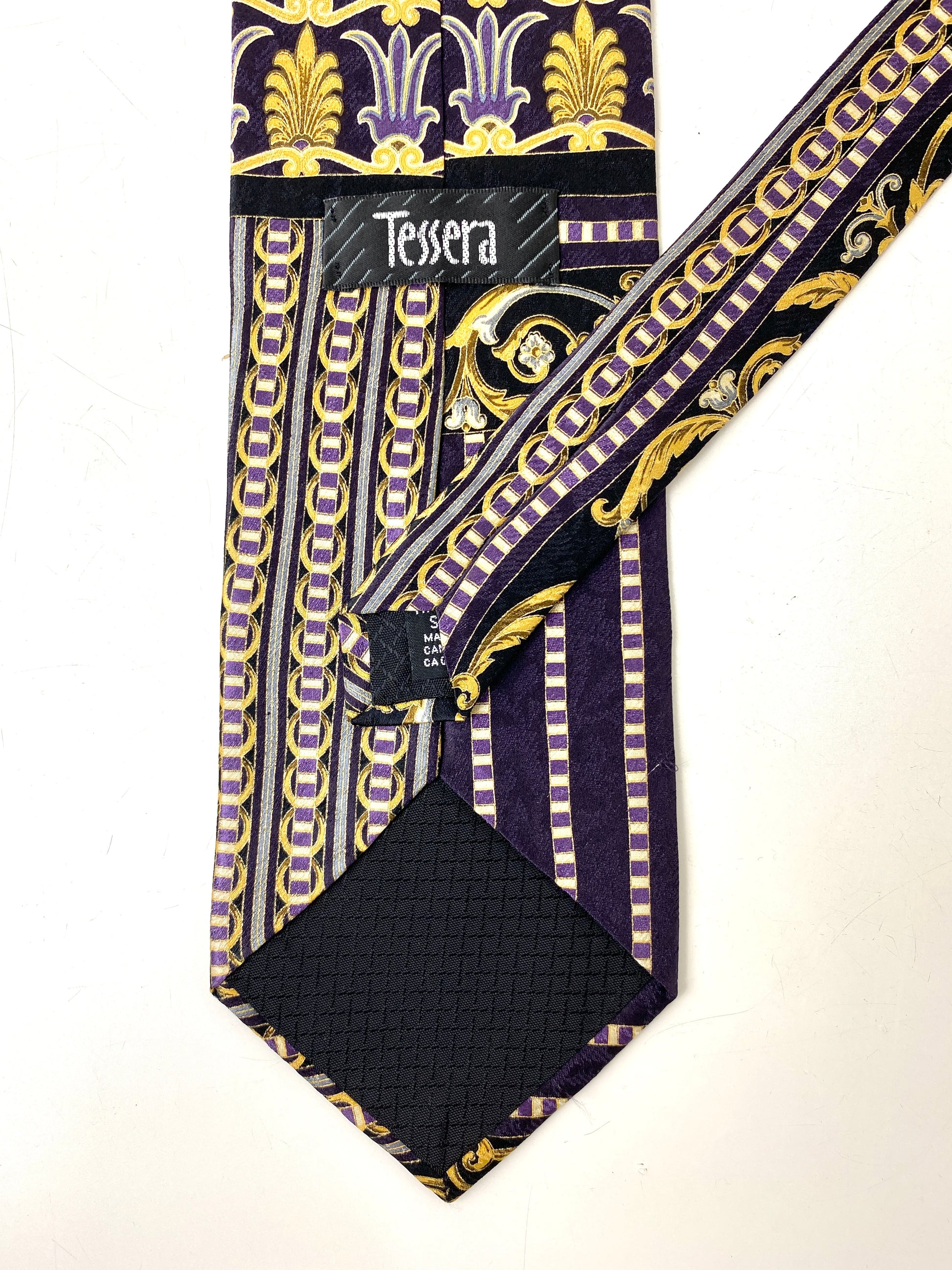 Back and labels of: 90s Deadstock Silk Necktie, Men's Vintage Black/ Purple/ Gold Art Nouveau Print Tie, NOS