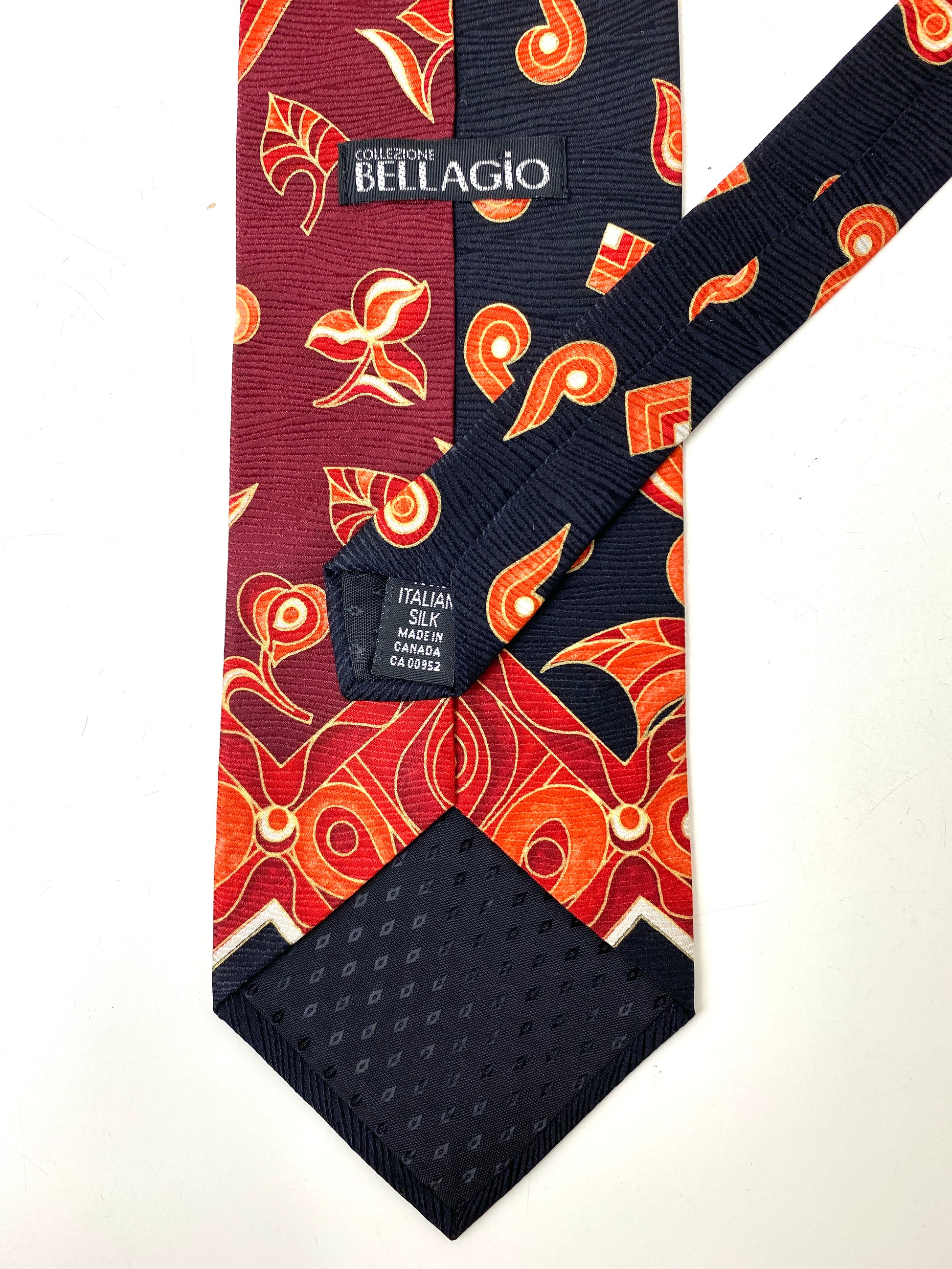 Back and labels of: 90s Deadstock Silk Necktie, Men's Vintage Black/ Red/ Orange Oriental Paisley Print Tie, NOS