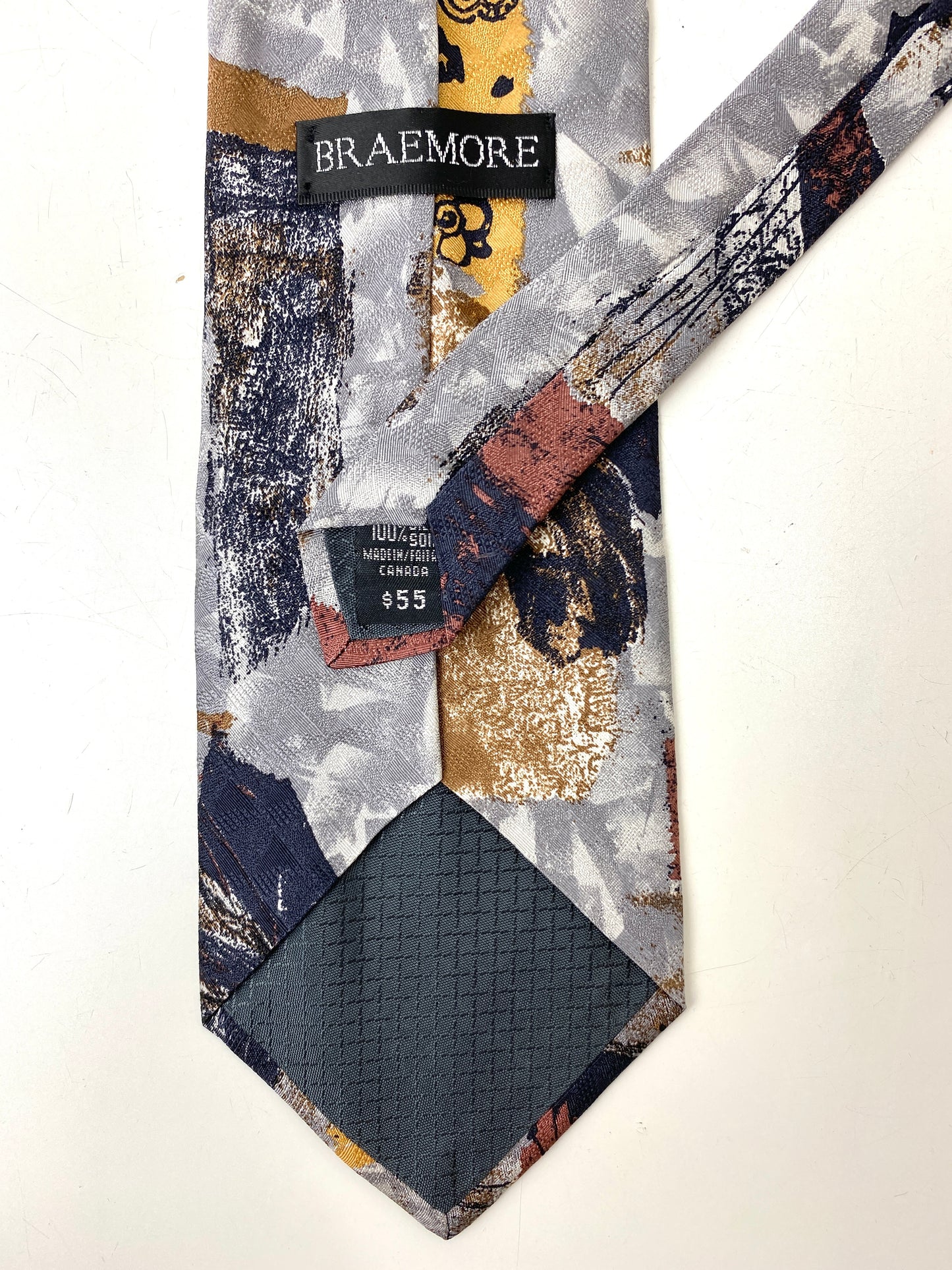 Back and labels of: 90s Deadstock Silk Necktie, Men's Vintage Grey/ Navy Abstract Pattern Tie, NOS