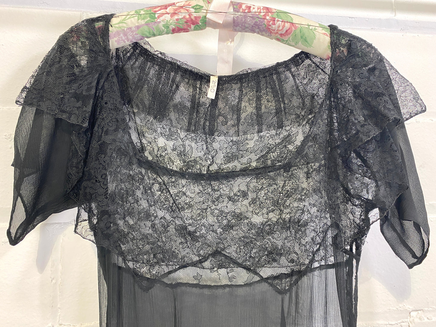 D157.07-60 Black Lace With Silver Satin Backing Floral