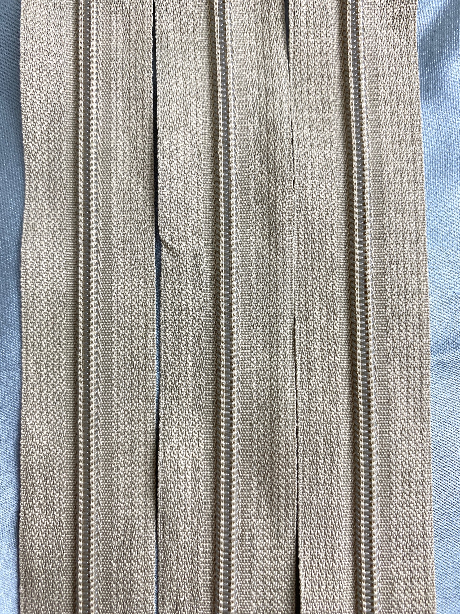 Medium tan vintage plastic zippers. Ian Drummond Vintage.