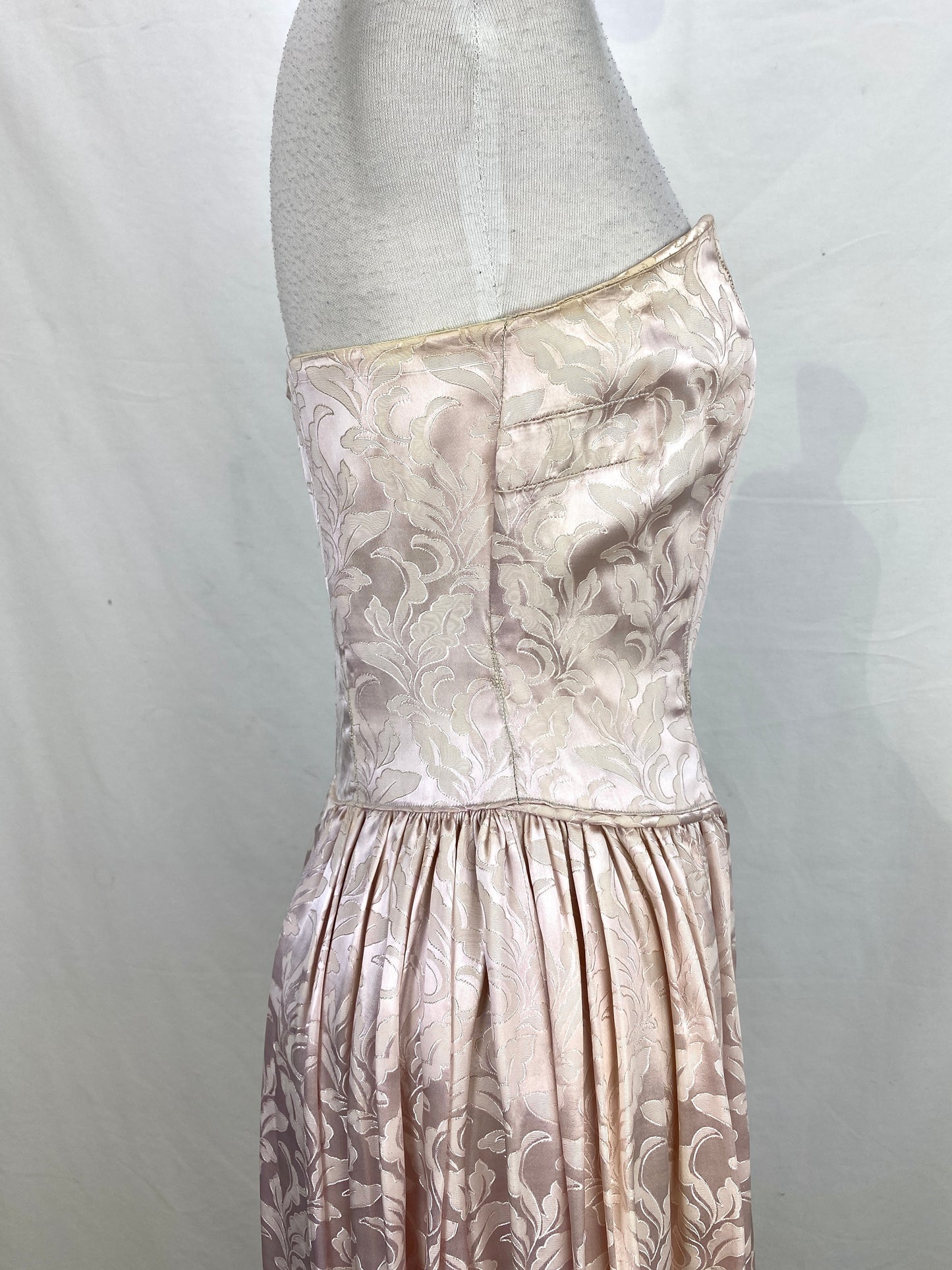Right side view of bodice on 1950s pink brocade gown. Ian Drummond Vintage.  