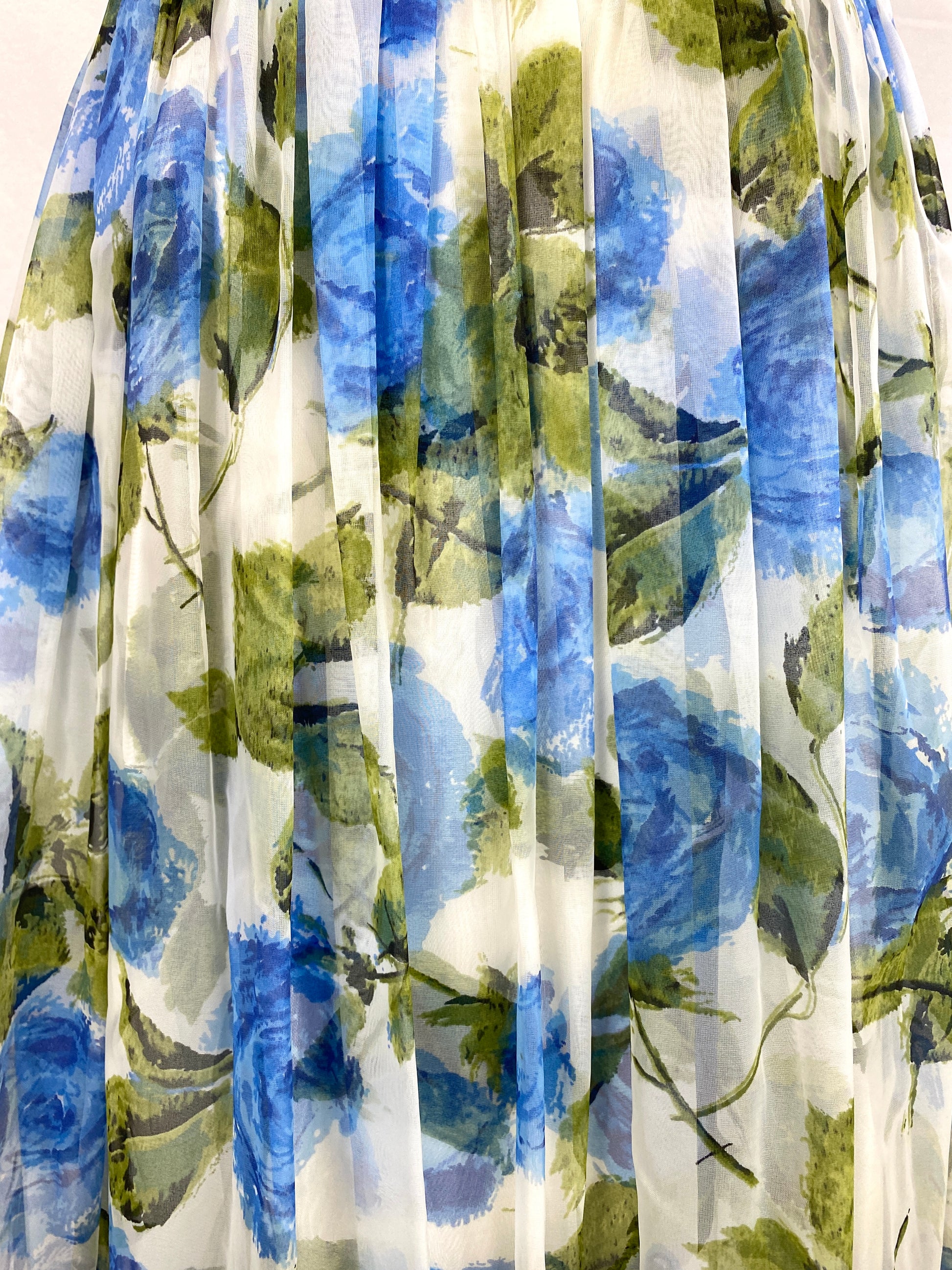 Close-up of skirt of 50s floral print dress. Ian Drummond Vintage. 