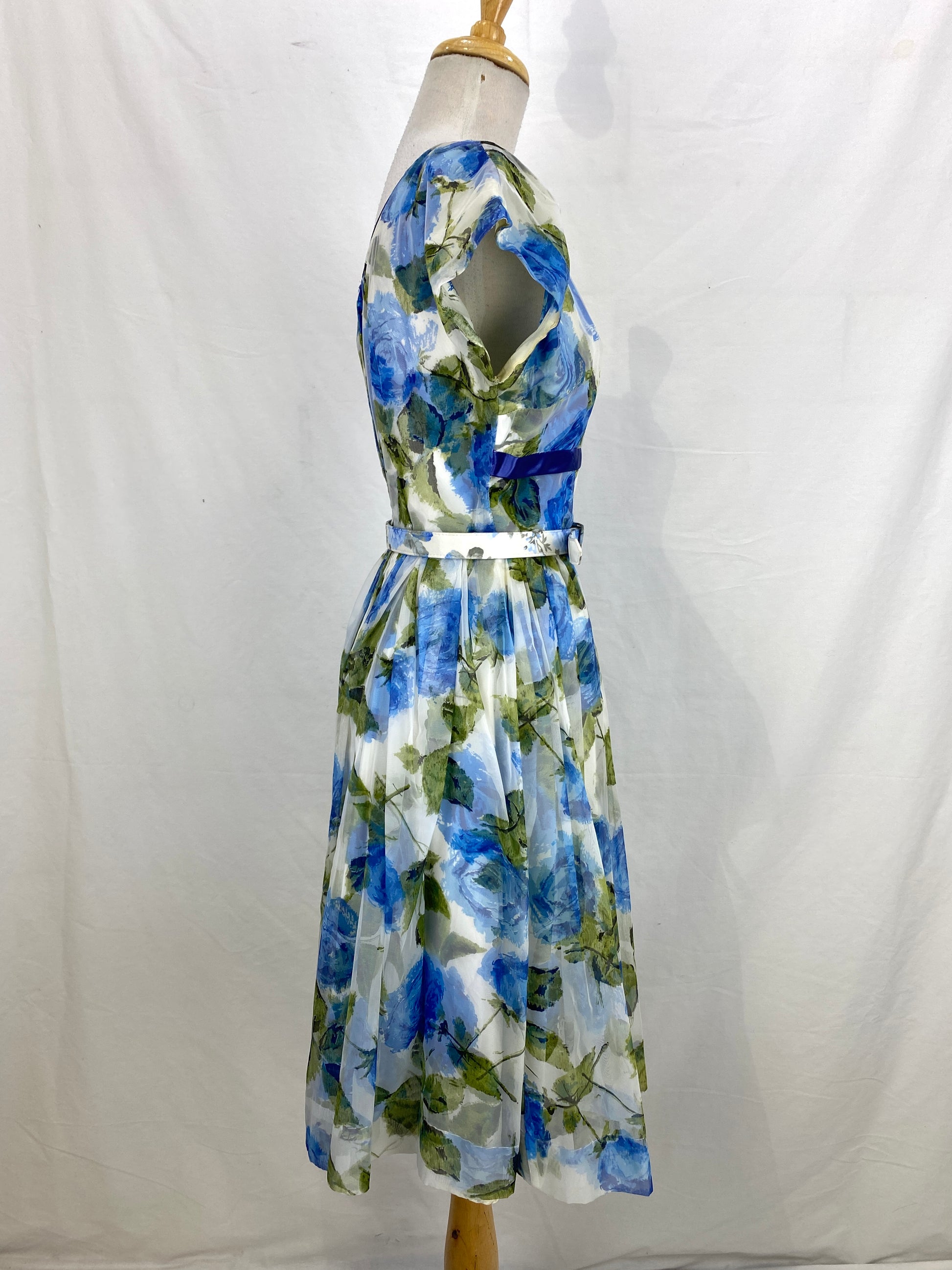 Right side view of green & blue floral print dress. Ian Drummond Vintage. 