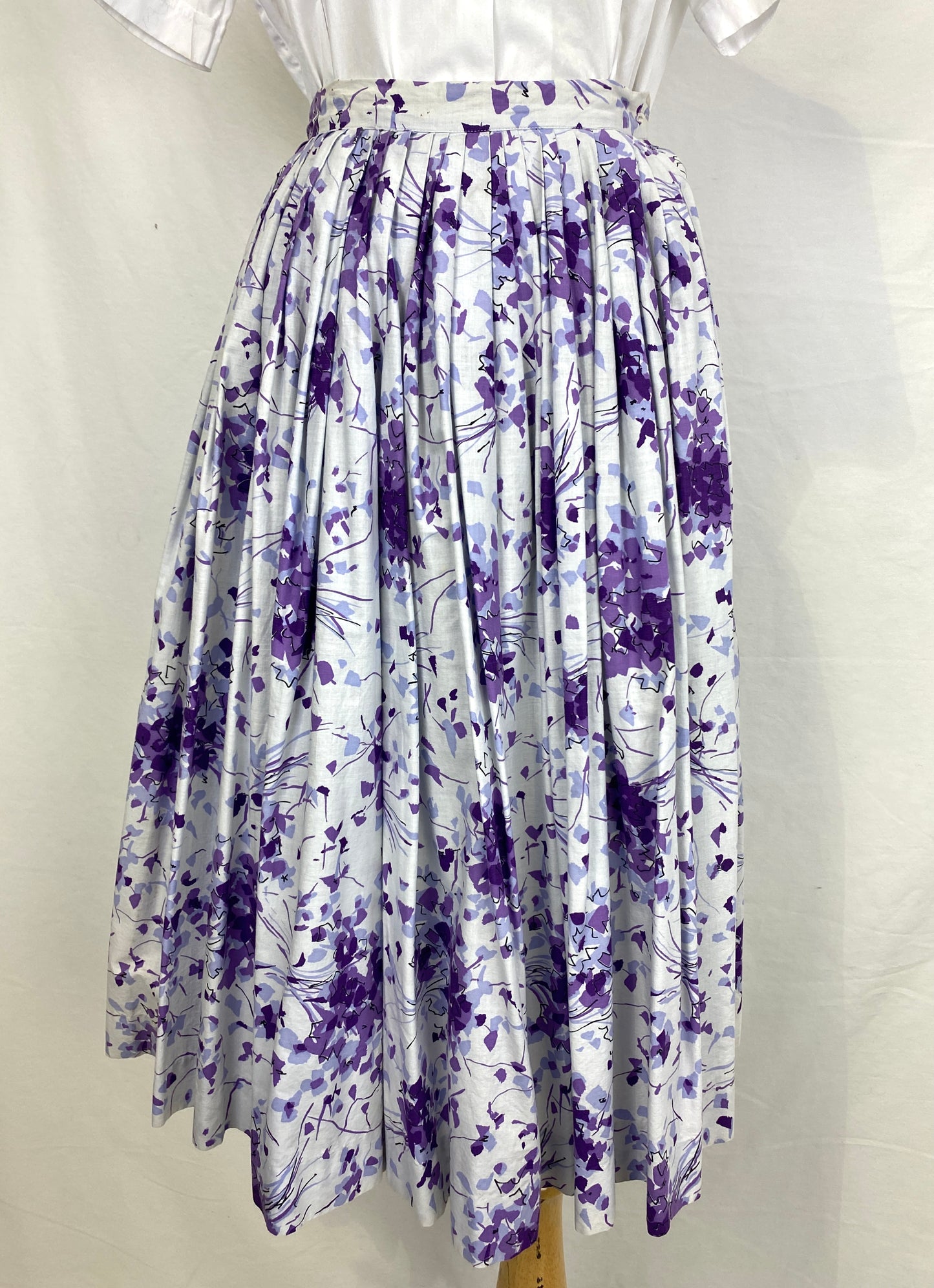Front of purple print 1950s skirt. Ian Drummond Vintage. 