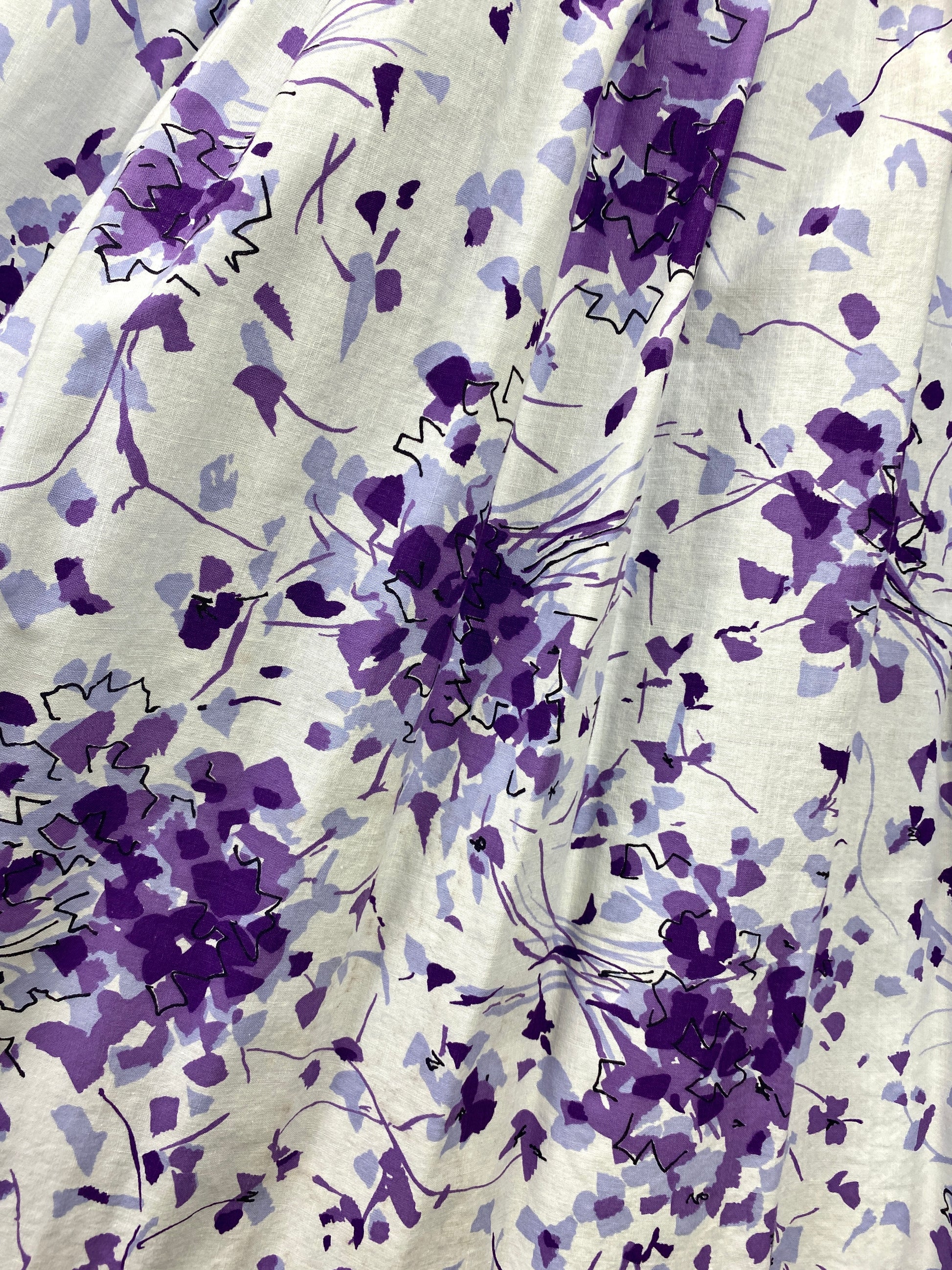 Print details on white cotton full 50s skirt with purple and black. Ian Drummond Vintage. 