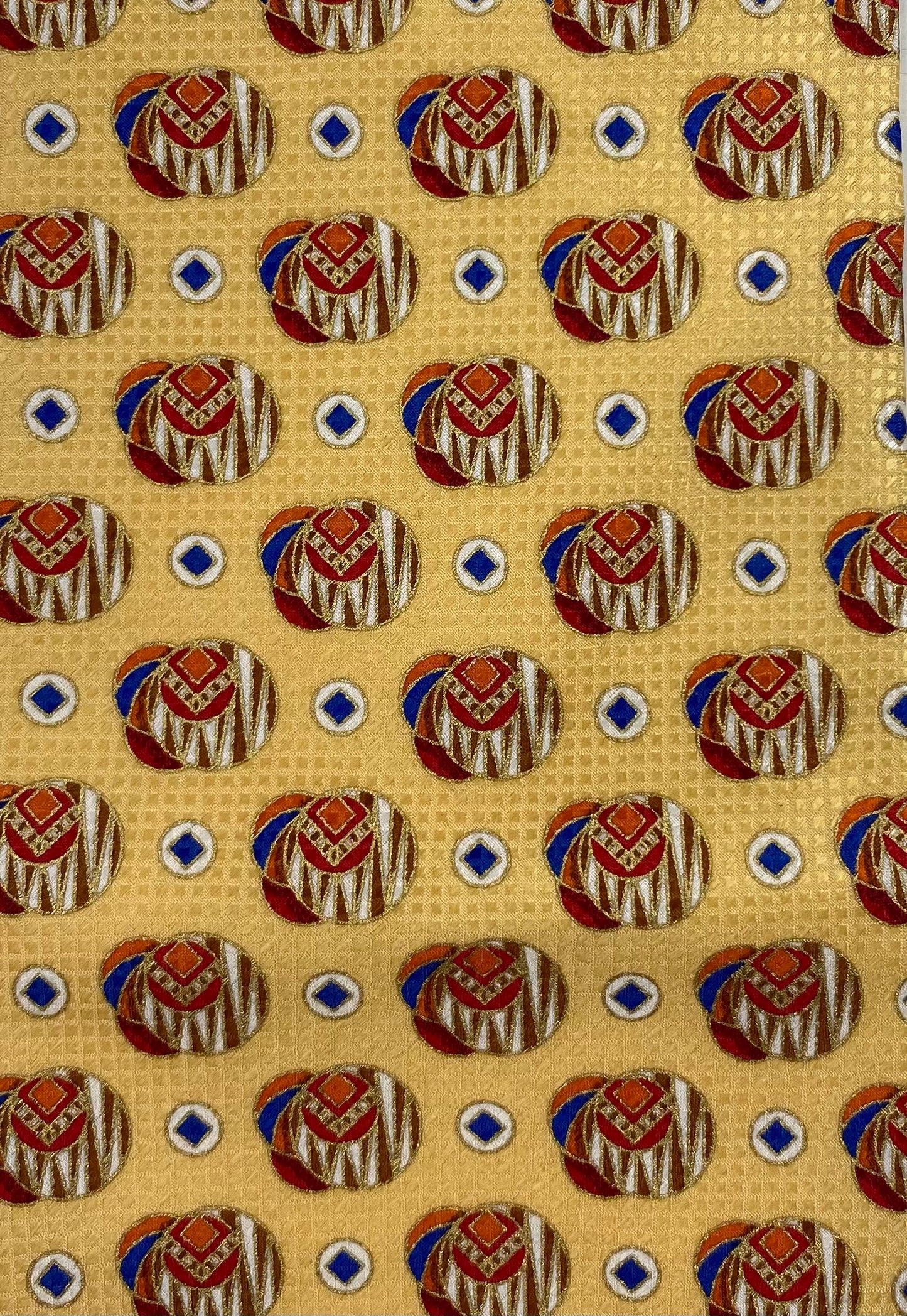 Close-up pattern detail of: 90s Deadstock Silk Necktie, Men's Vintage Gold Red Blue Geometric Pattern Tie, NOS