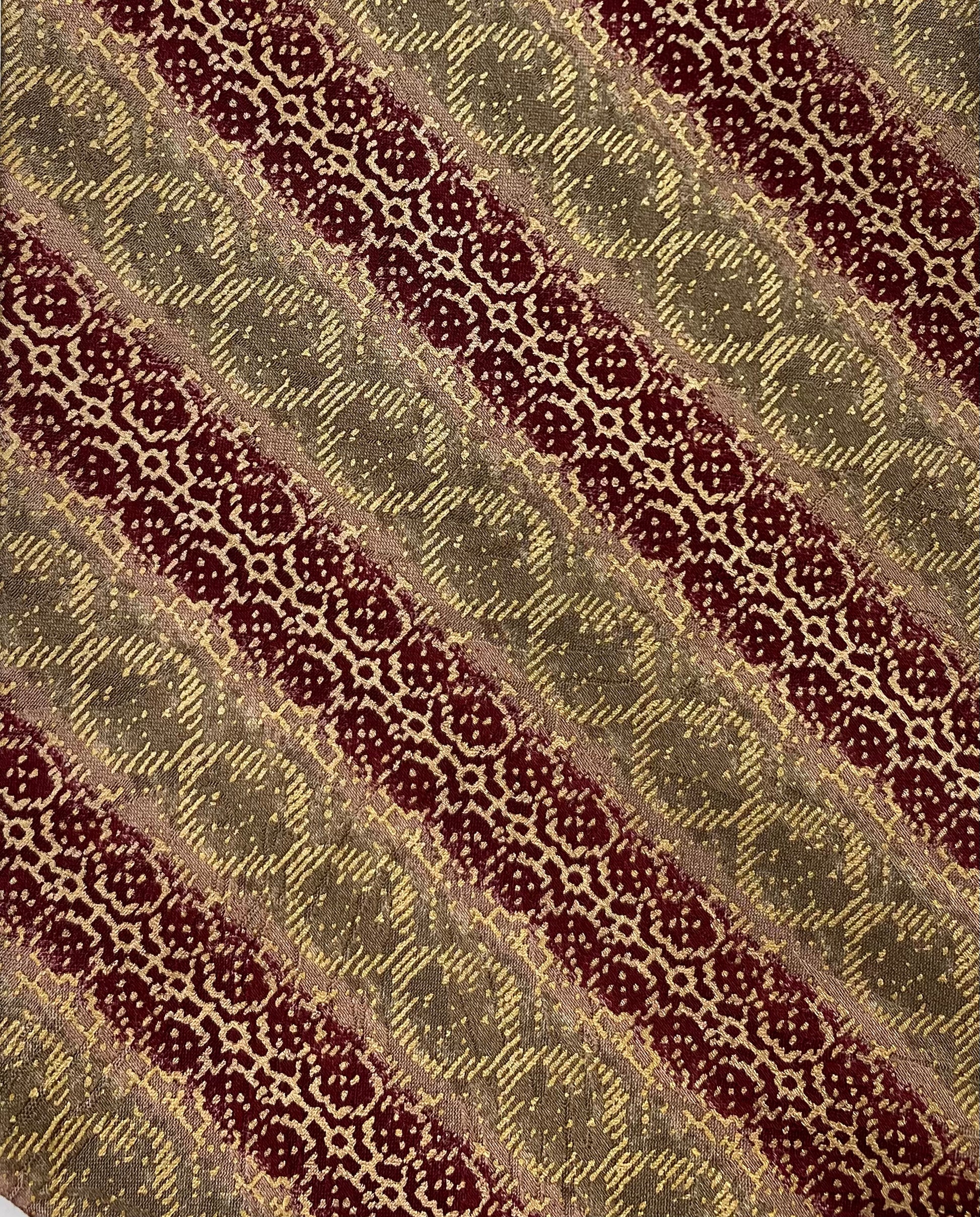 Close-up pattern detail of: 90s Deadstock Silk Necktie, Men's Vintage Gold Red Diagonal Stripe Trellis Pattern Tie, NOS