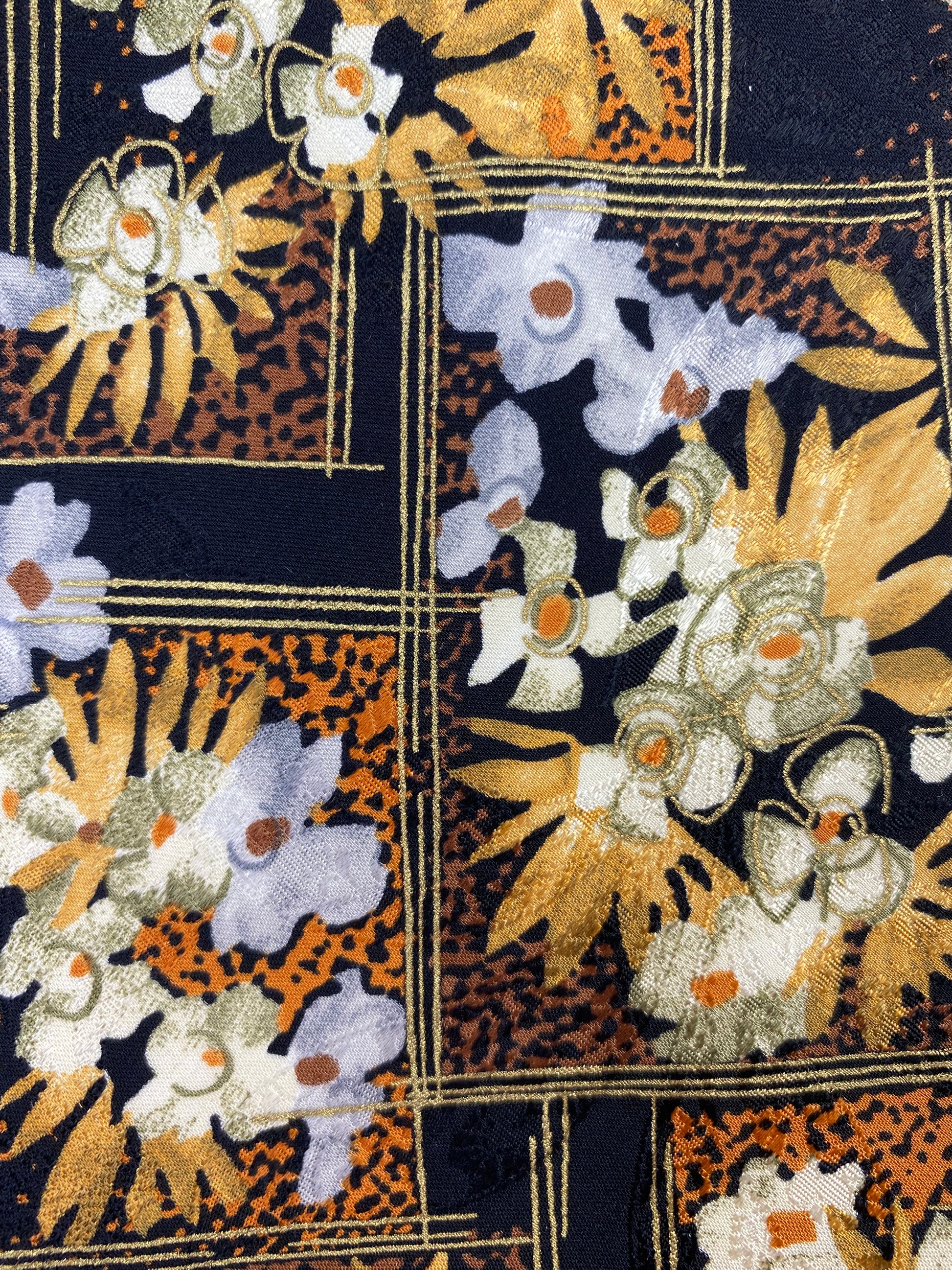 Close-up pattern detail of: 90s Deadstock Silk Necktie, Men's Vintage Blue Tulip/ Red Daisy Floral Pattern Gold Tie, NOS