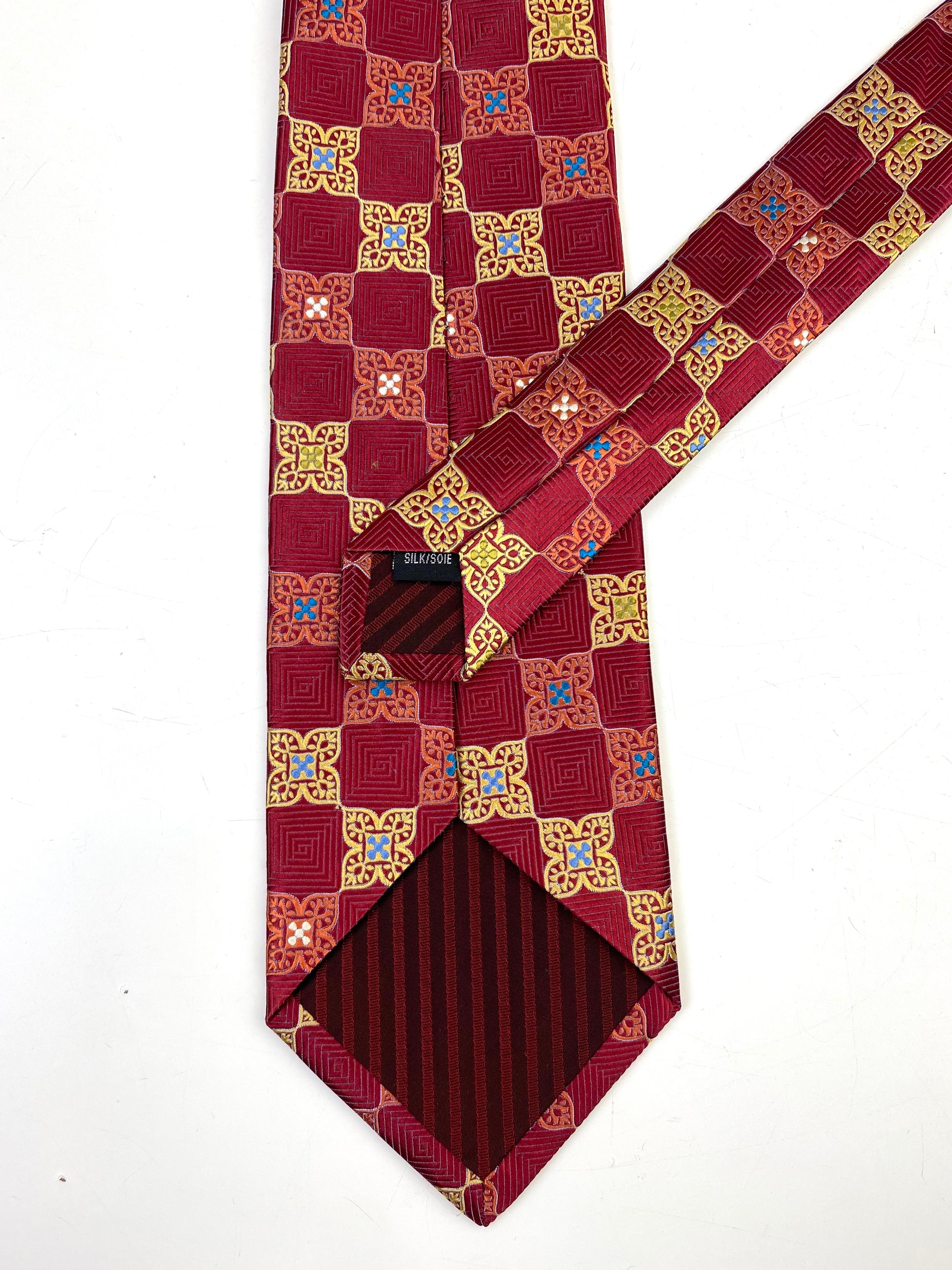 Back and labels of: 90s Deadstock Silk Necktie, Men's Vintage Wine/ Gold Moroccan Pattern Tie, NOS