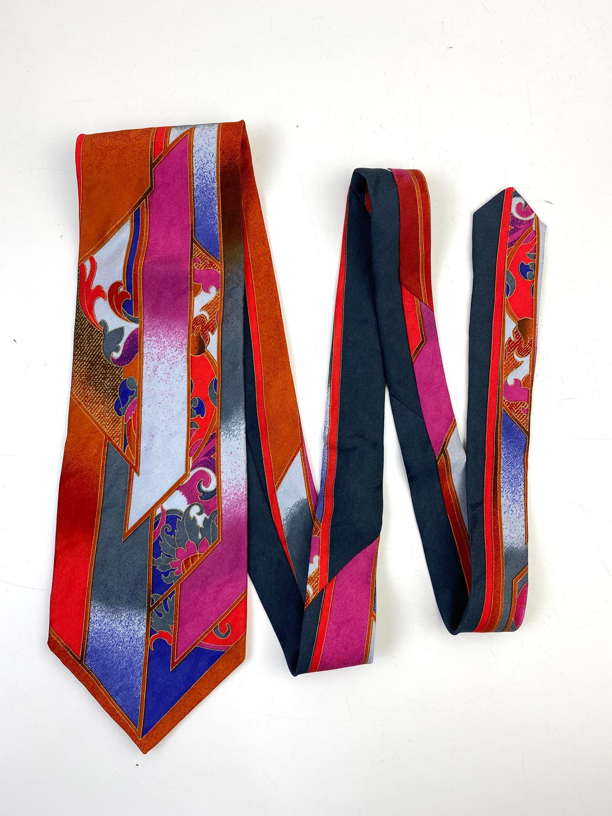 Front of: 90s Deadstock Silk Necktie, Men's Vintage Red/ Pink/ Orange Filigree Pattern Tie, NOS