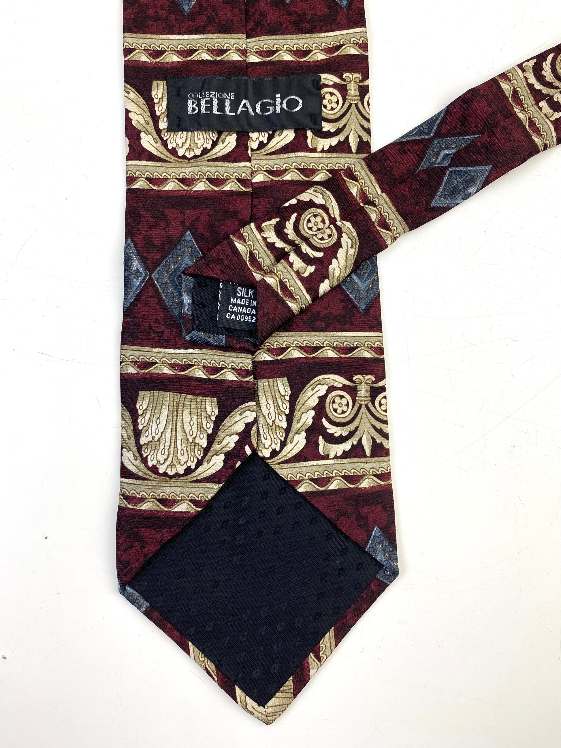 Back and labels of: 90s Deadstock Silk Necktie, Men's Vintage Wine/ Taupe/ Blue Classical Pattern Tie, NOS