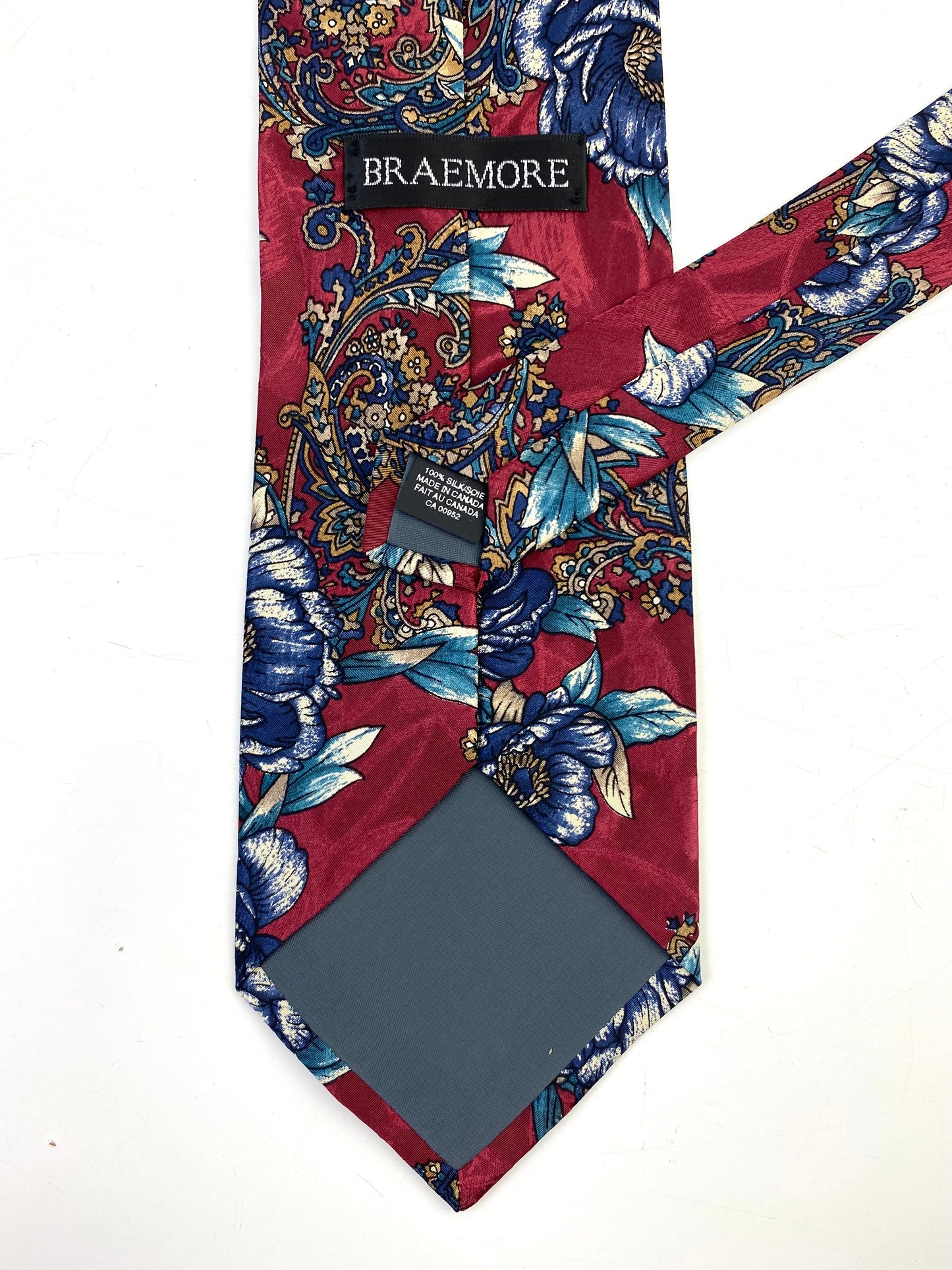 Back and labels of: 90s Deadstock Silk Necktie, Men's Vintage Wine/ Navy Oriental Floral Pattern Tie, NOS