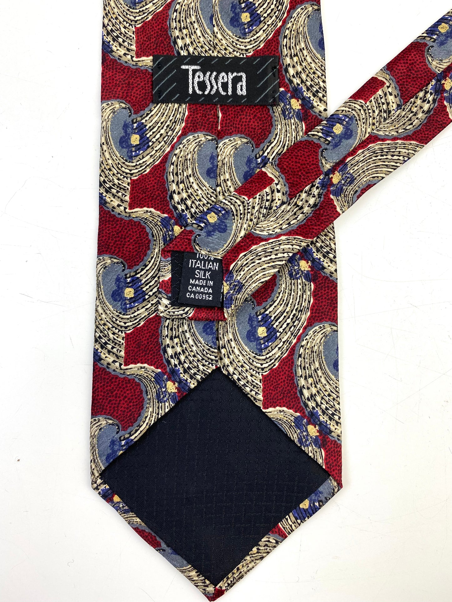 Back and labels of: 90s Deadstock Silk Necktie, Men's Vintage Wine/ Blue Abstract Floral Pattern Tie, NOS