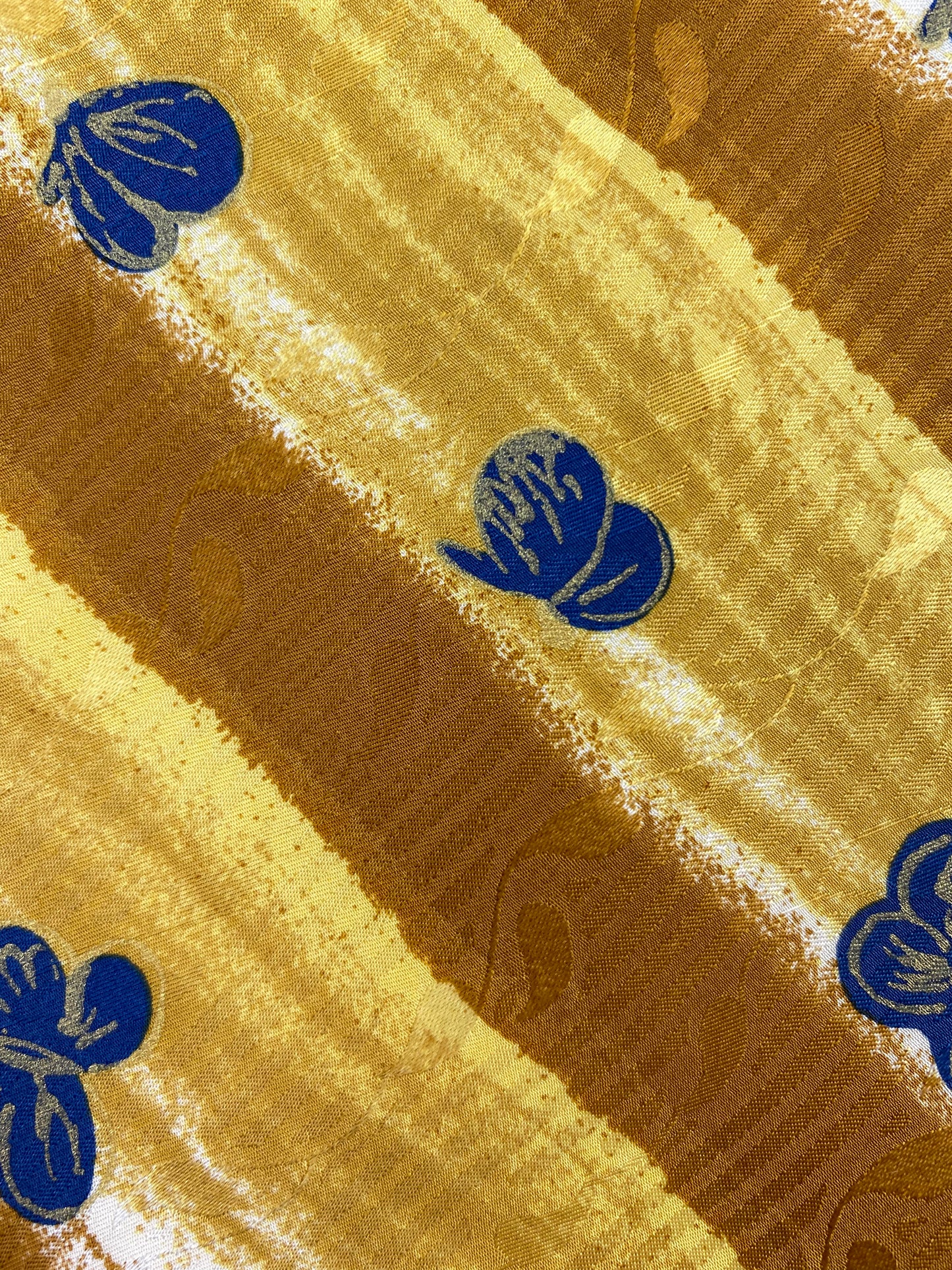 Close-up of: 90s Deadstock Silk Necktie, Men's Vintage Gold Stripe Blue Butterfly Pattern Tie, NOS