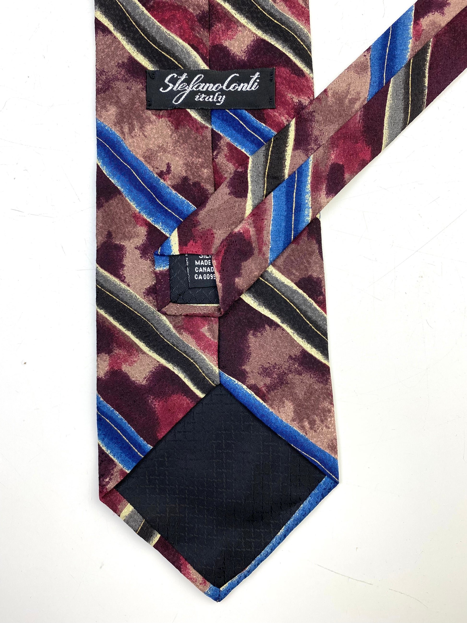 Back and labels of: 90s Deadstock Silk Necktie, Men's Vintage Wine Blue Diagonal Stripe Pattern Tie, NOS