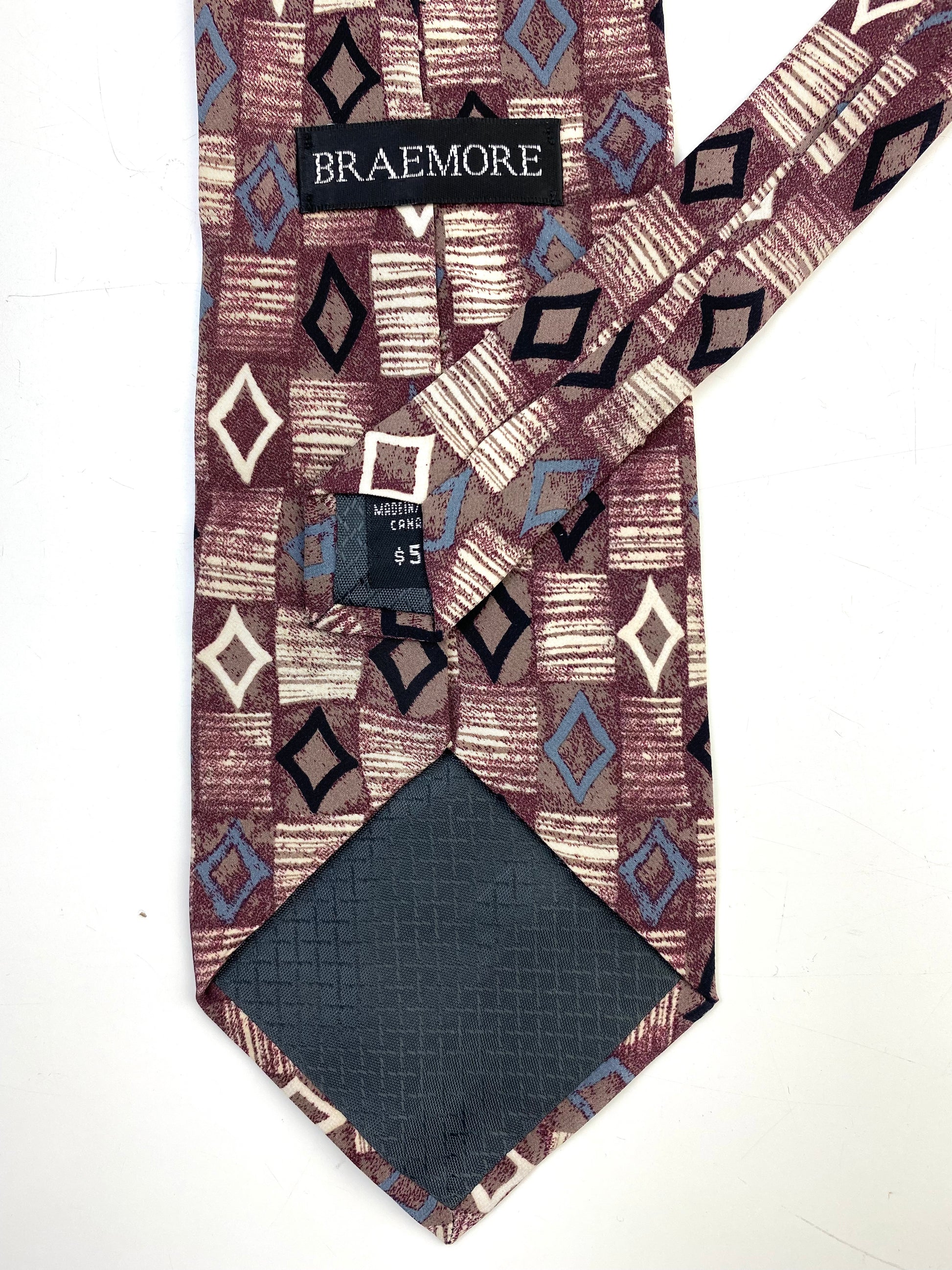 Back and labels of: 90s Deadstock Silk Necktie, Men's Vintage Wine/ Black/ White Geometric Pattern Tie, NOS