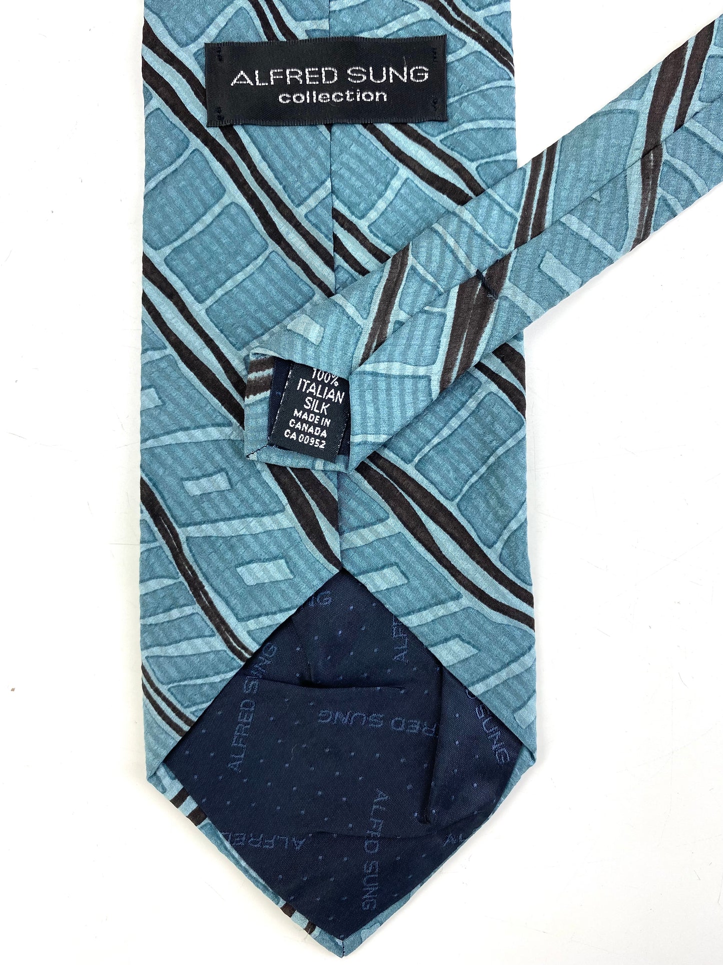 Back and labels of: 90s Deadstock Silk Necktie, Men's Vintage Black Diagonal Stripe Pattern Tie, NOS