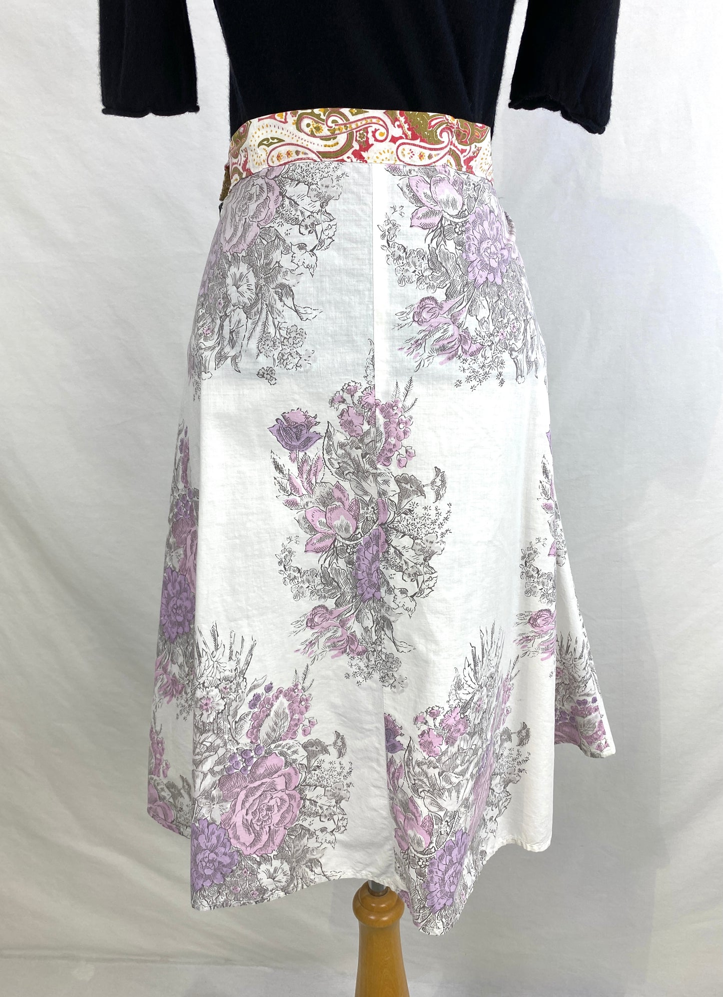 Back view of a 1950s lavender & grey floral print skirt. Ian Drummond Vintage. 