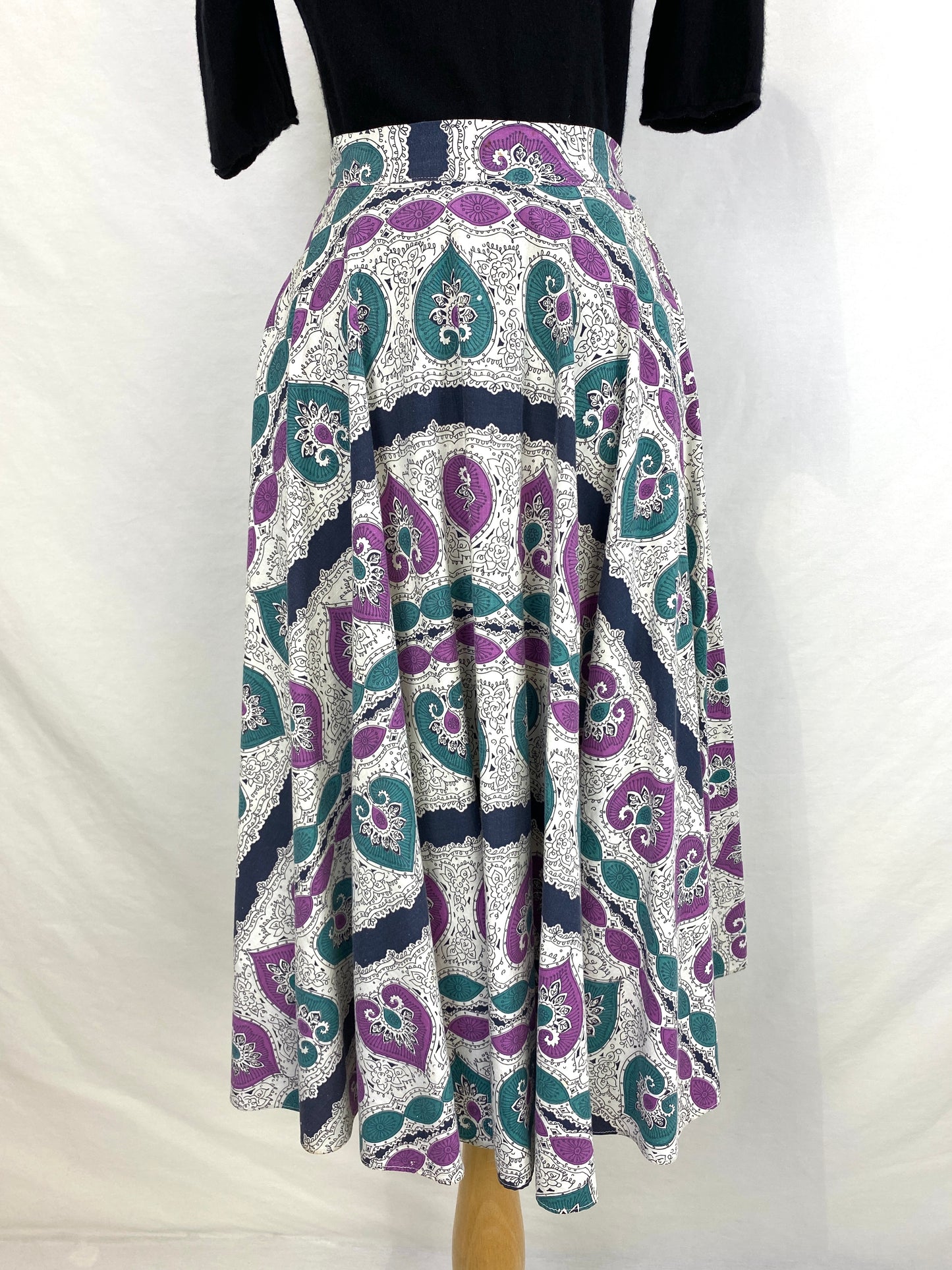 Front view of purple & teal Indian print 50s skirt. Ian Drummond Vintage. 