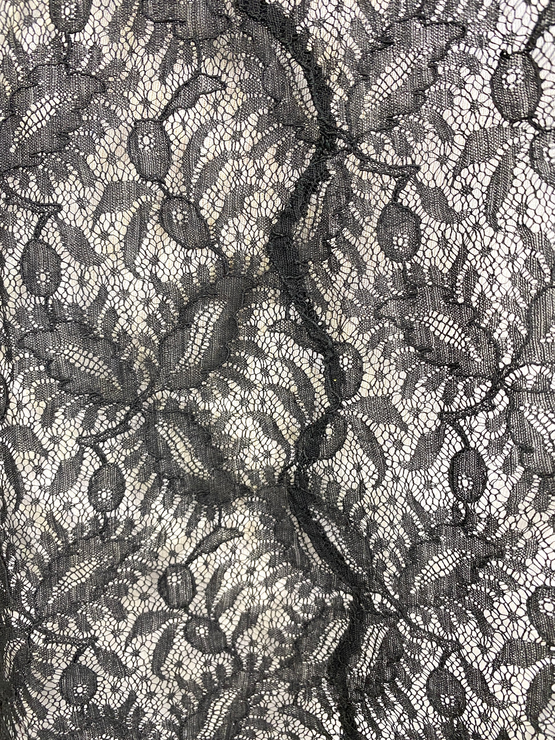 Black lace fabric close-up on 1960s dress. Ian Drummond Vintage. 