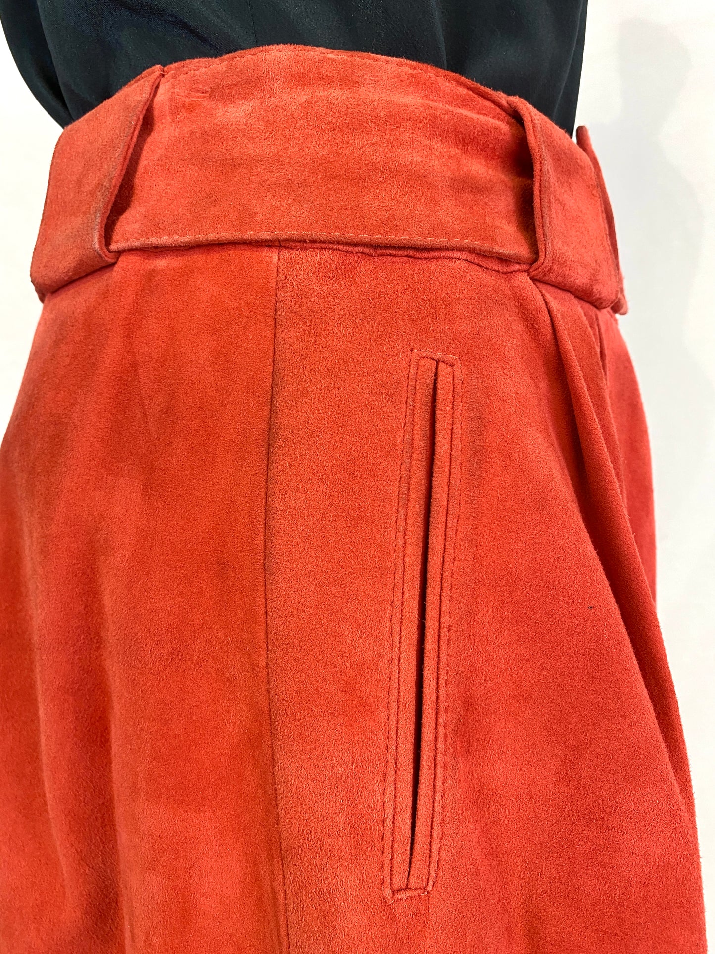 Close-up of side welt pocket and waistband on 90s suede shorts. Ian Drummond Vintage. 